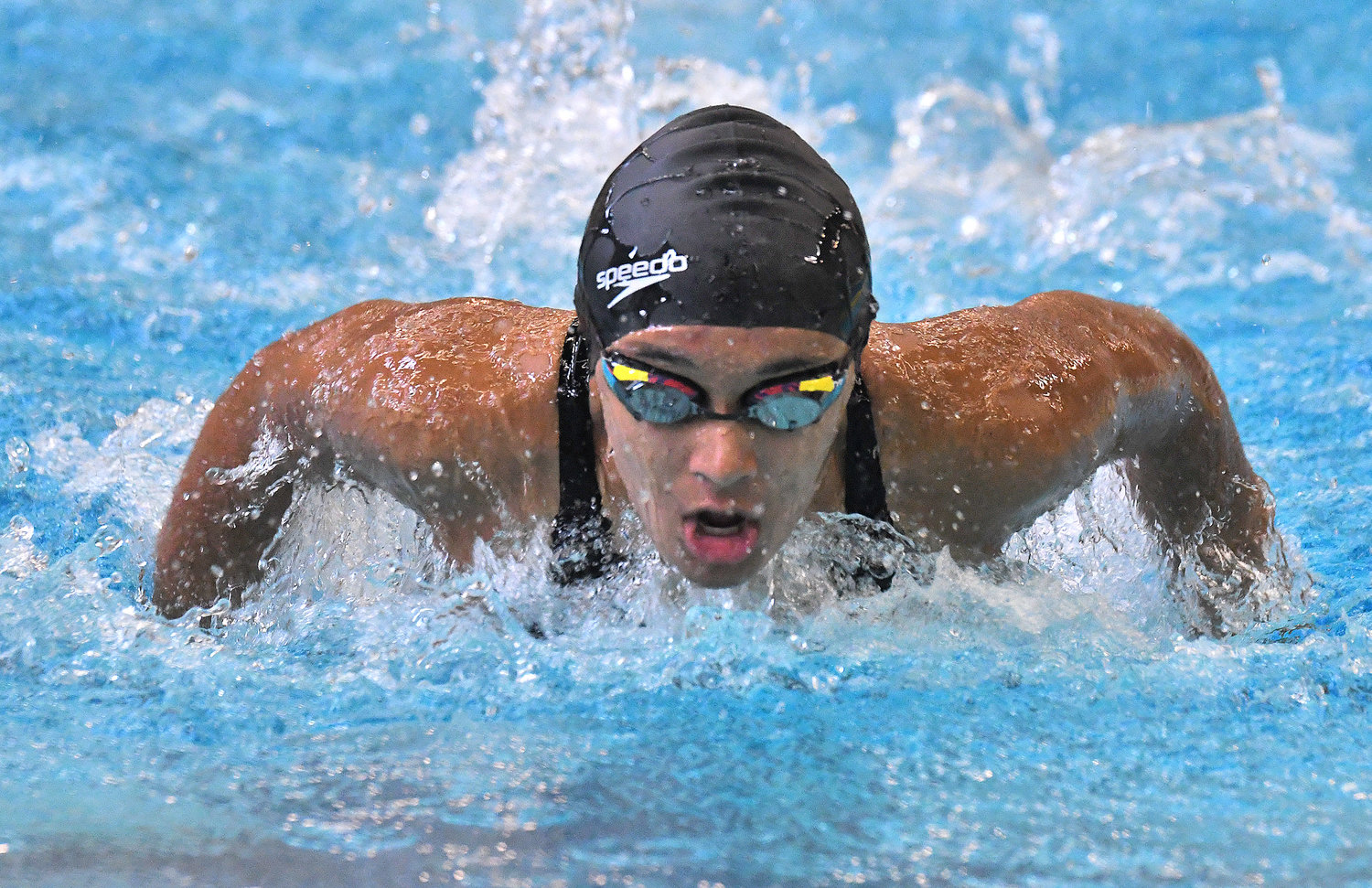 Rome Free Academy swimmer Imani Pugh competes in the butterfly portion of the 200 individual medley Thursday at Holland Patent. Pugh won the race in 2:37.38 and RFA won the meet 57-39.