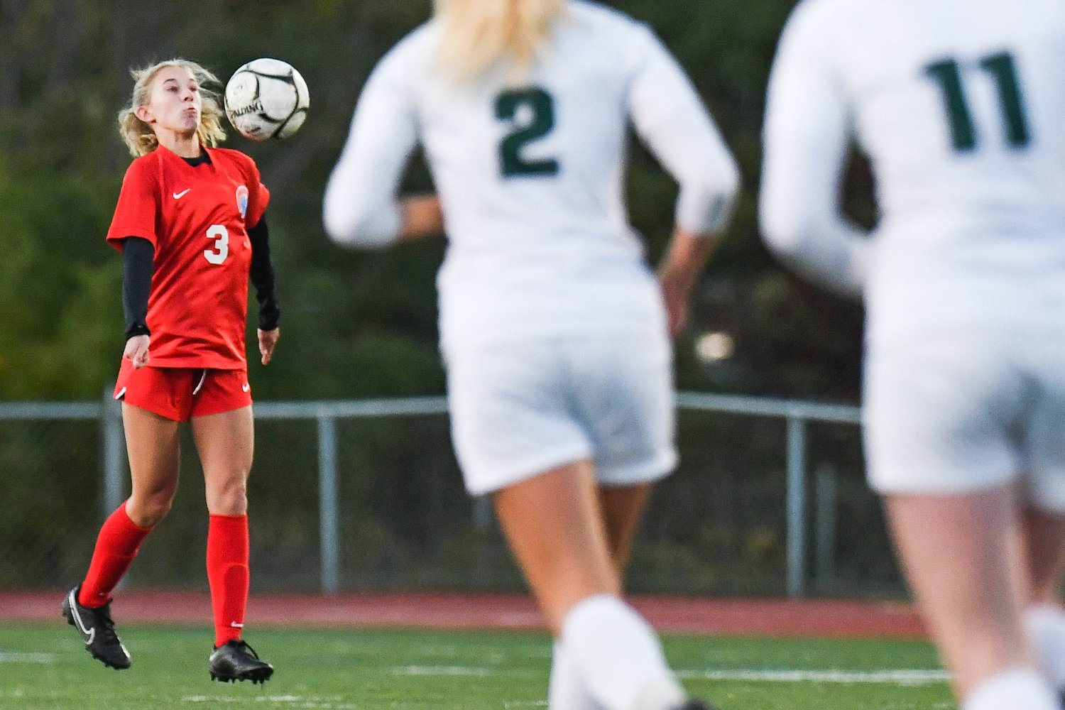 New Hartford's Grace Serafin settles the ball during the game against Fayetteville-Manlius on Monday night in New Hartford. The Spartans won 4-0, and the defending Class A state champions' unbeaten streak is now 51 games.