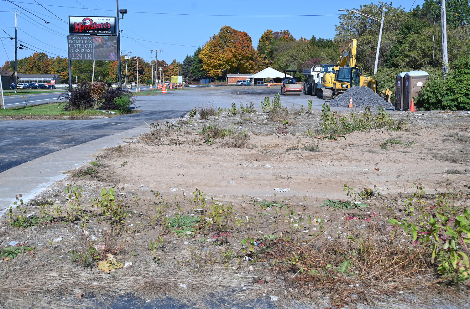 Work continues at the site of Mazzaferro’s Meats & Deli on Ridge Mills Road in Rome on  Tuesday as Rome’s Zoning Board of Appeals has approved a pair of use variances for construction of the store, which replaces one that was destroyed by fire.