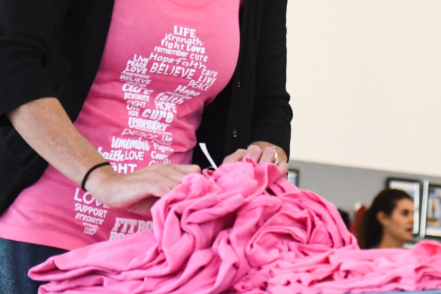Breast cancer awareness shirts are being sold at Whitesboro Fit Body Boot Camp. The gym is raising money for breast cancer with the hopes of raising $6,000 by the end of the month.