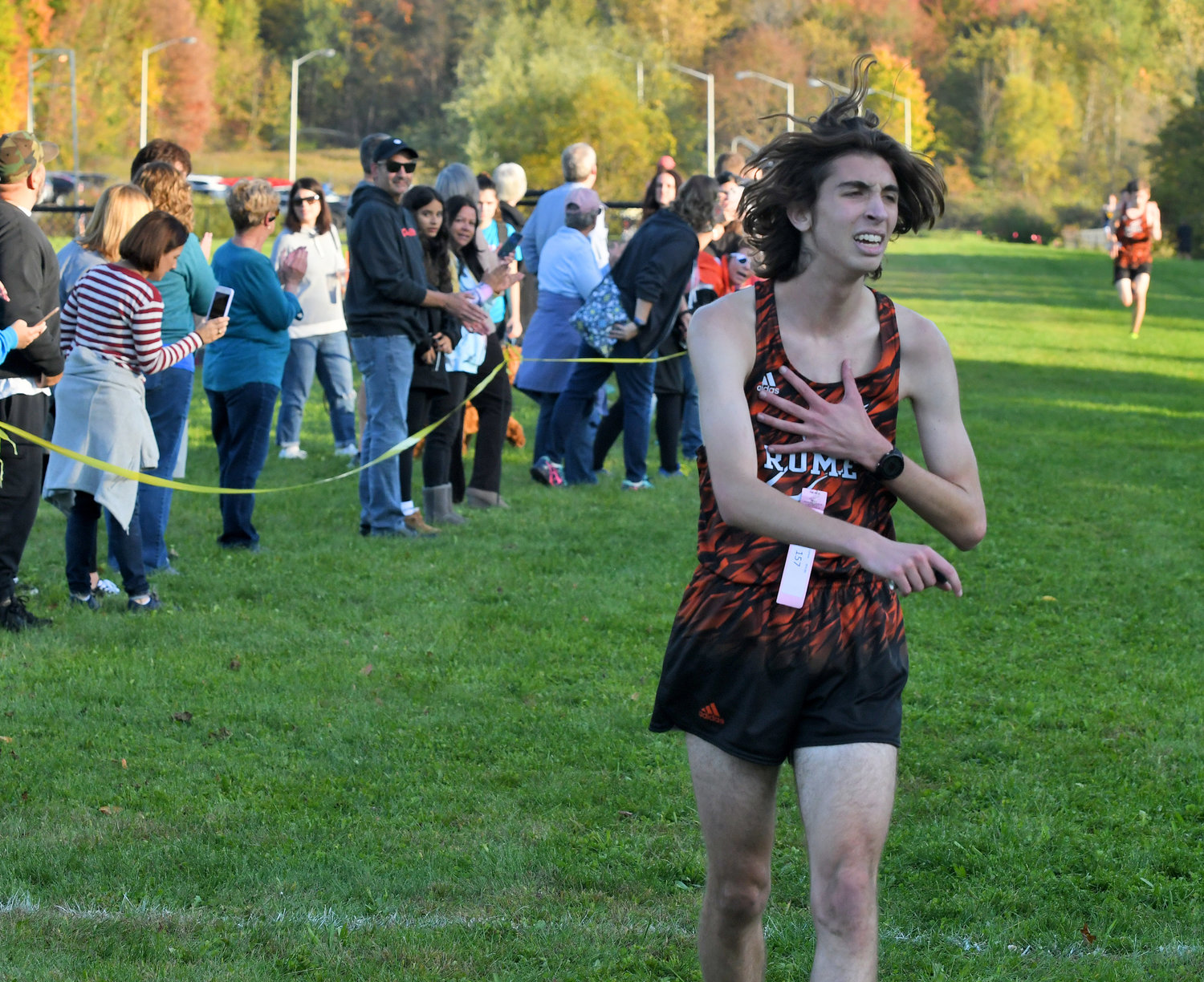 Rome Free Academy cross country runner Carson Campbell reacts after finishing second at the race Tuesday afternoon hosted by the Black Knights.