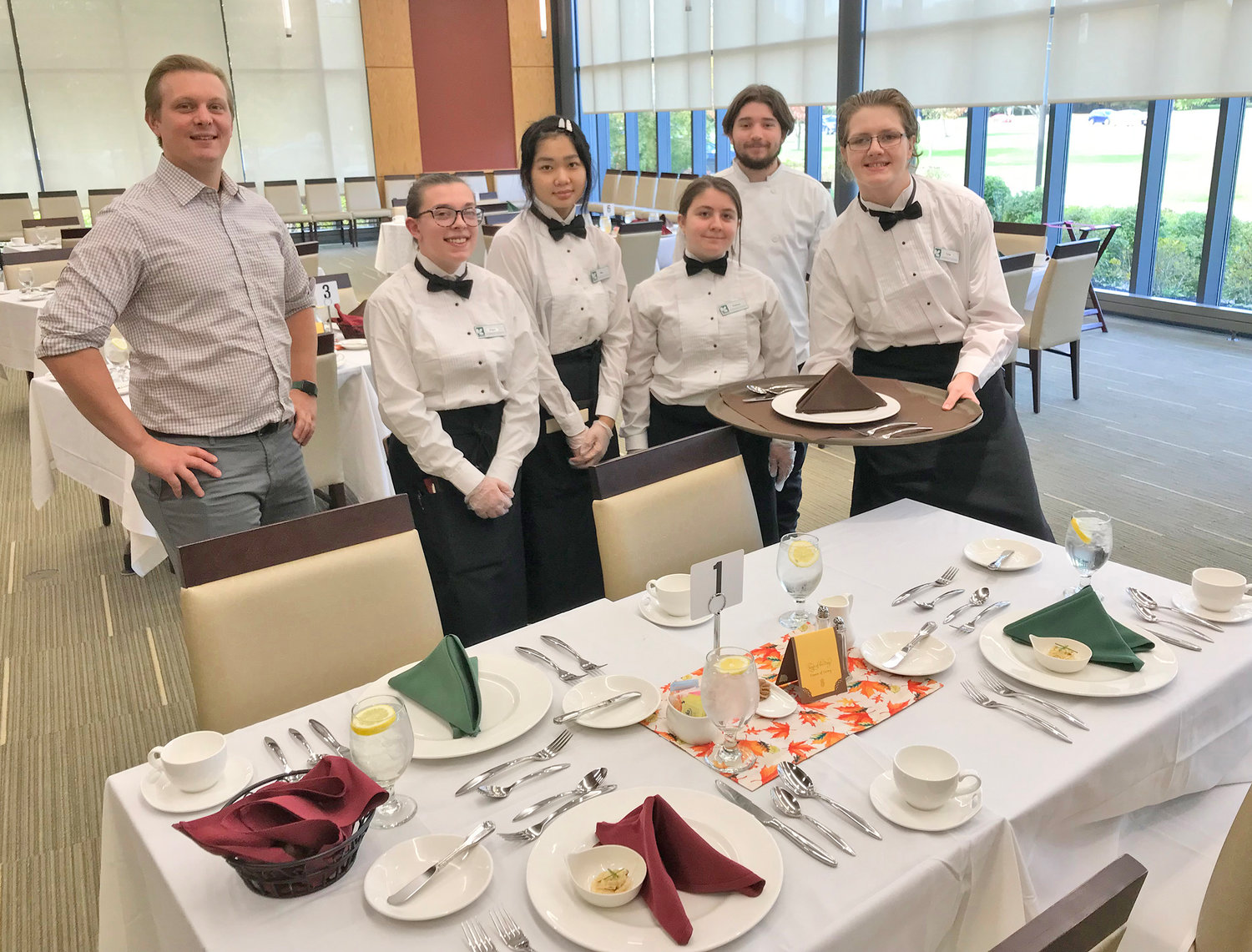 Mohawk Valley Community College hospitality program Director Vincent Petronio, left, and students, from left, Angel Lamb, Moolay Shee, Raelynn Briggs, Zach Getz and Tyler Hall invite the public out to the campus Wednesdays through Nov. 16 for gourmet luncheons prepared and served by the students themselves.