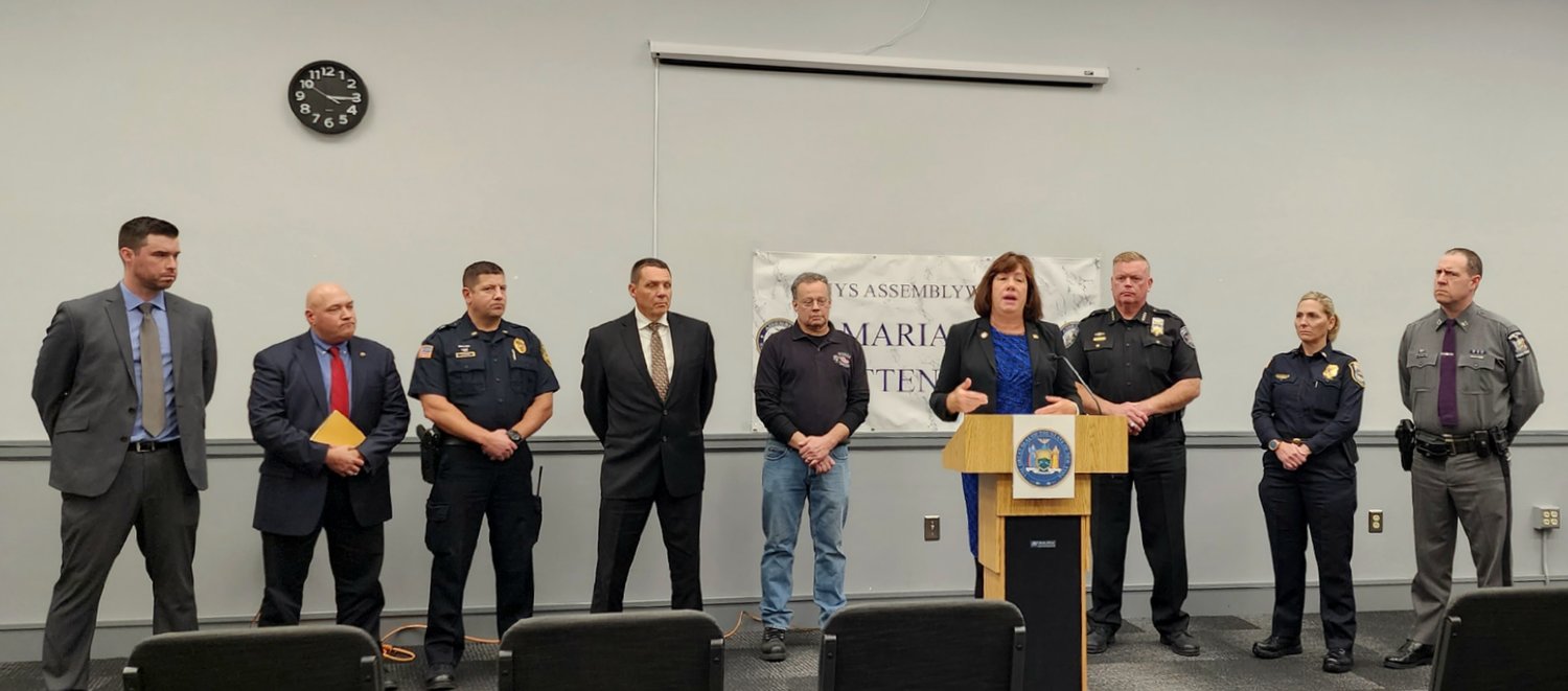 New York State Assemblywoman Marianne Buttenschon appeared in Utica on Monday to announce the signing of her bill into law to combat catalytic converter thefts. She was joined by several local law enforcement leaders and car dealership representatives.