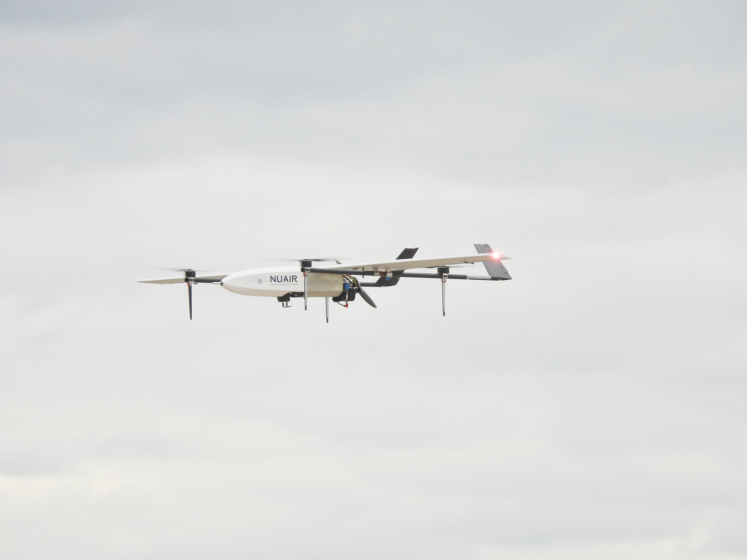 NUAIR's Supervolo drone flies more than 100 feet above Griffiss International Airport, getting ready to touch down for a landing