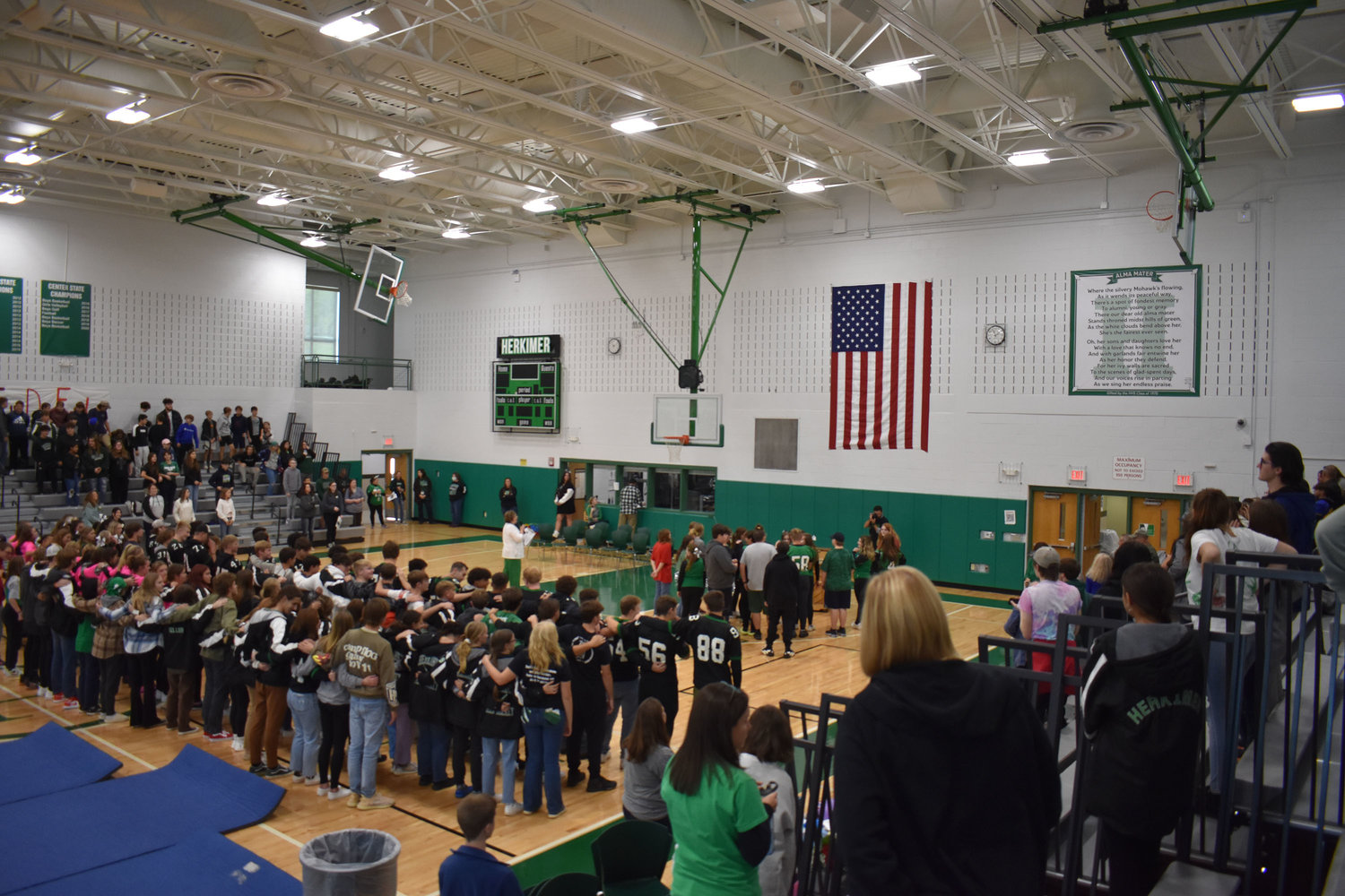 Herkimer Central School District students sing the alma mater after a banner donated by the Class of 1970 was unveiled during the Herkimer Jr./Sr. High School pep rally on Friday, Oct. 21.(Photo submitted)