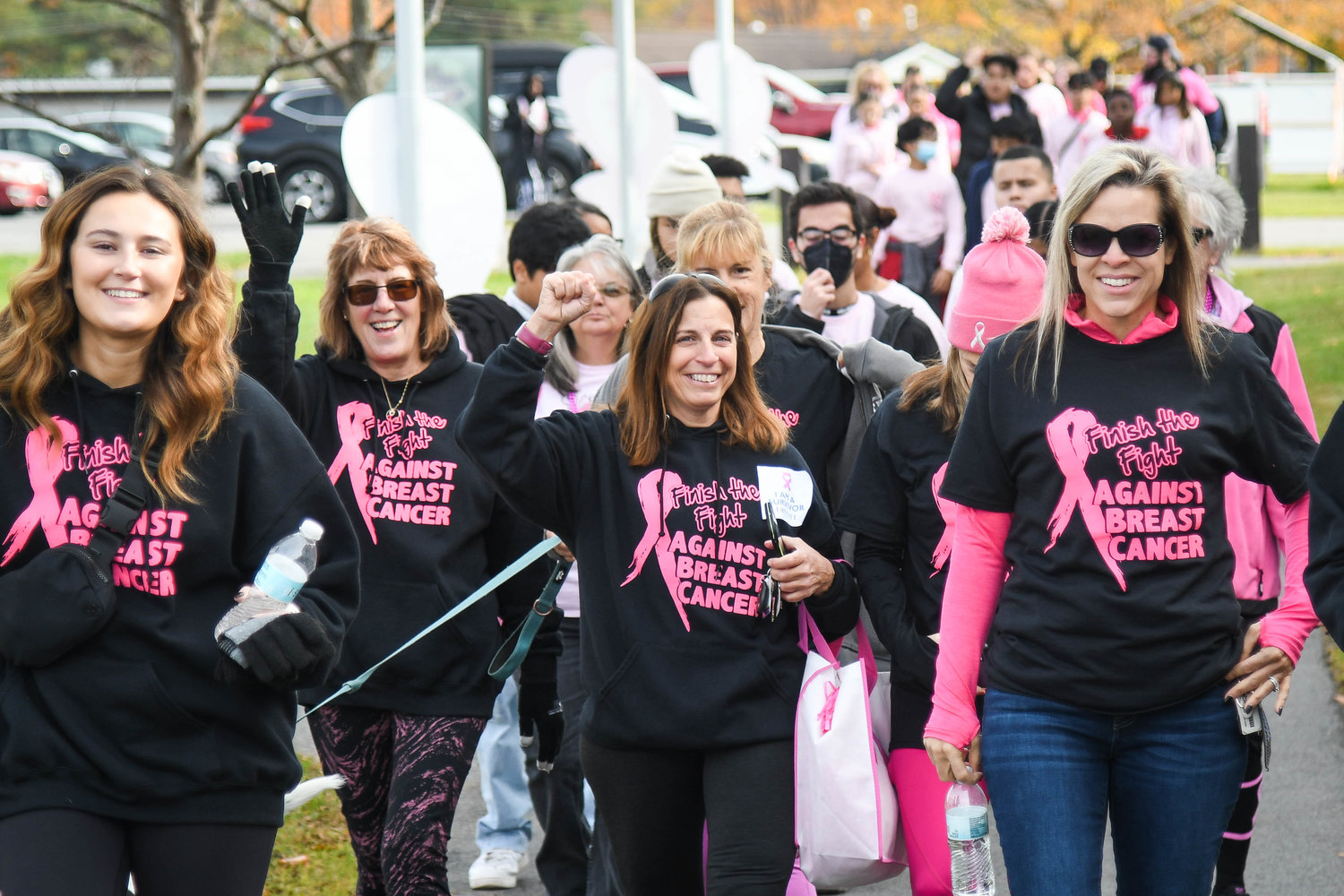 Supporters participate in the Making Strides Against Breast Cancer walk presented by Upstate Cancer Center Sunday at Mohawk Valley Community College in Utica.
