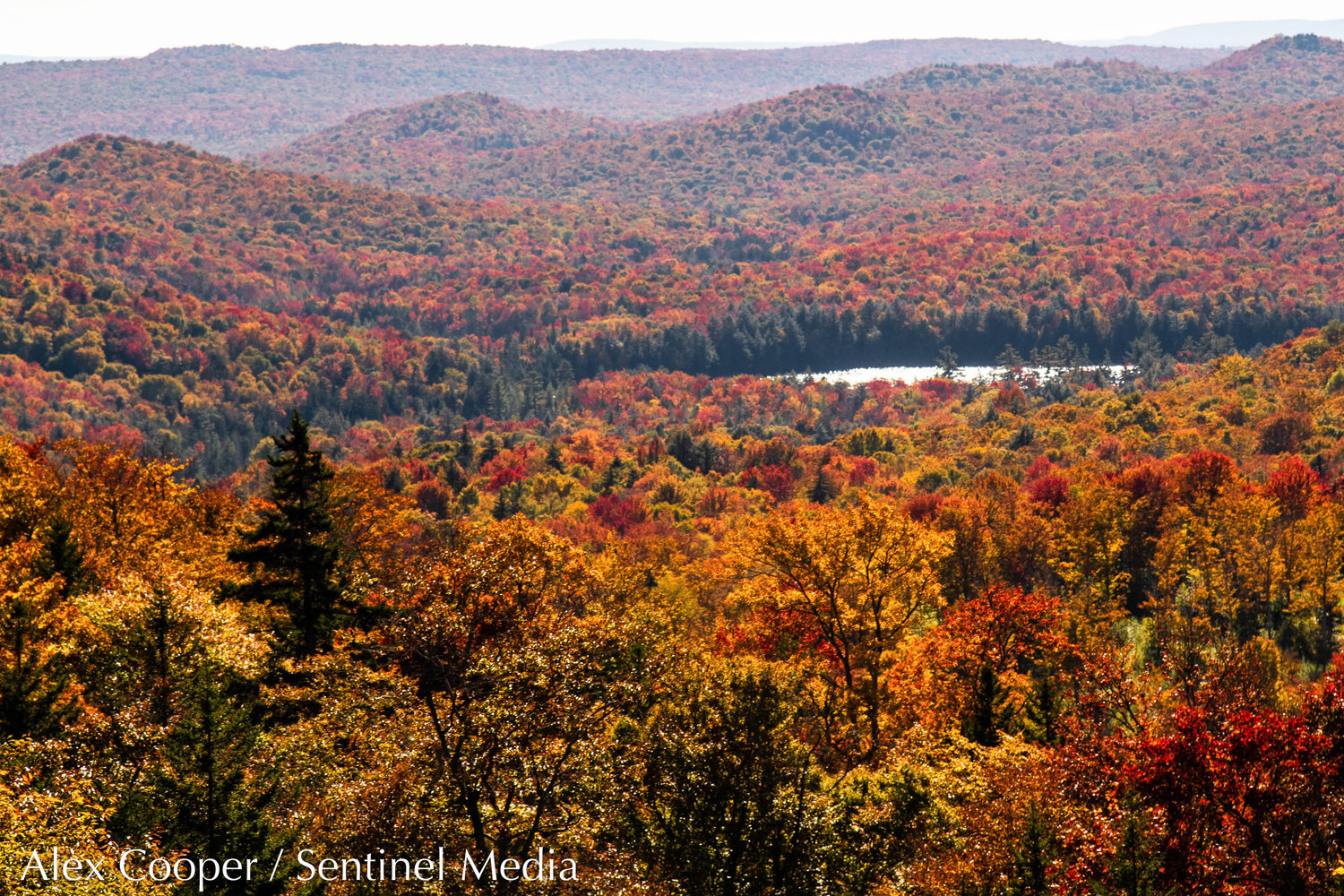 A view of peak fall foliage in the Adirondacks from the top of McCauley Mountain on Wednesday, Oct. 5 in Old Forge.