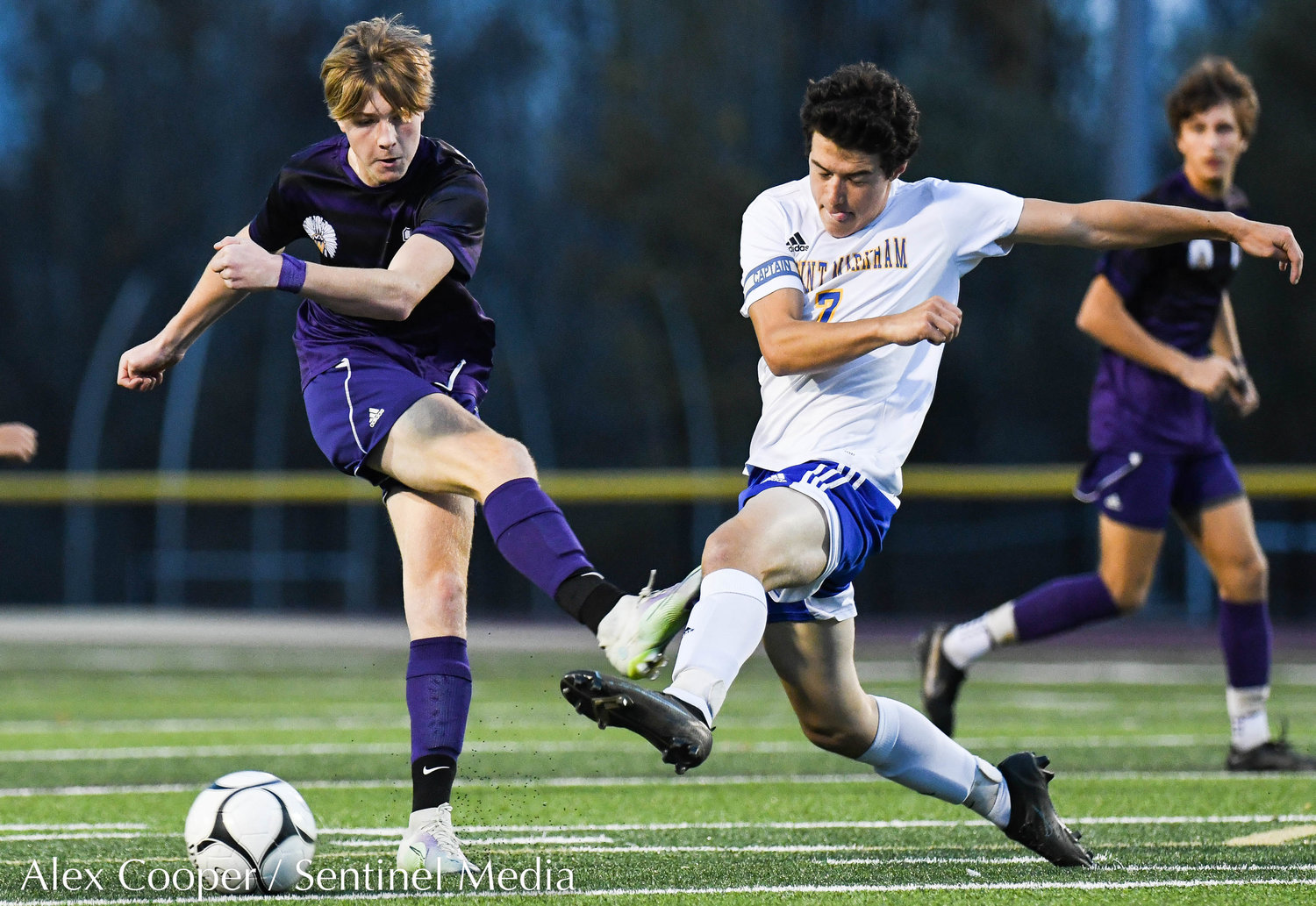 Waterville player Jonathon Stiles and Mt. Markham player Kevin Gates fight for control of the ball during the Class C boys soccer semifinals on Wednesday, Oct. 26 at Canastota.