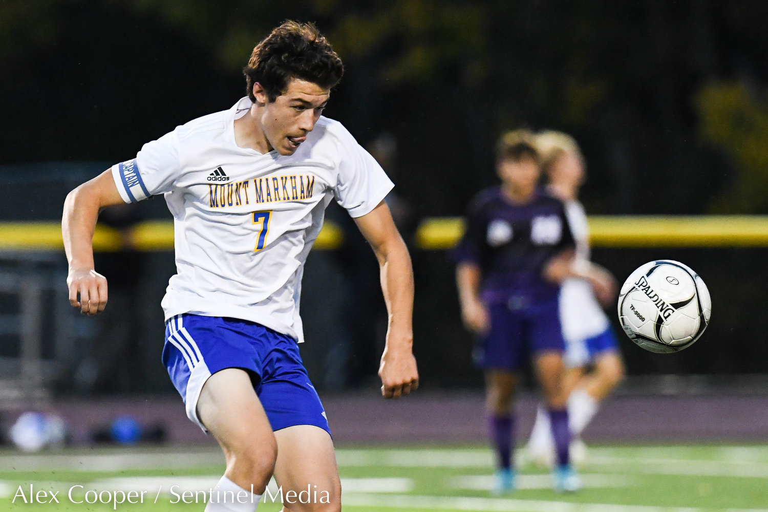 Mt. Markham player Kevin Gates (7) attempts to settle the ball during the Class C boys soccer semifinals game against Waterville on Wednesday, Oct. 26 at Canastota.