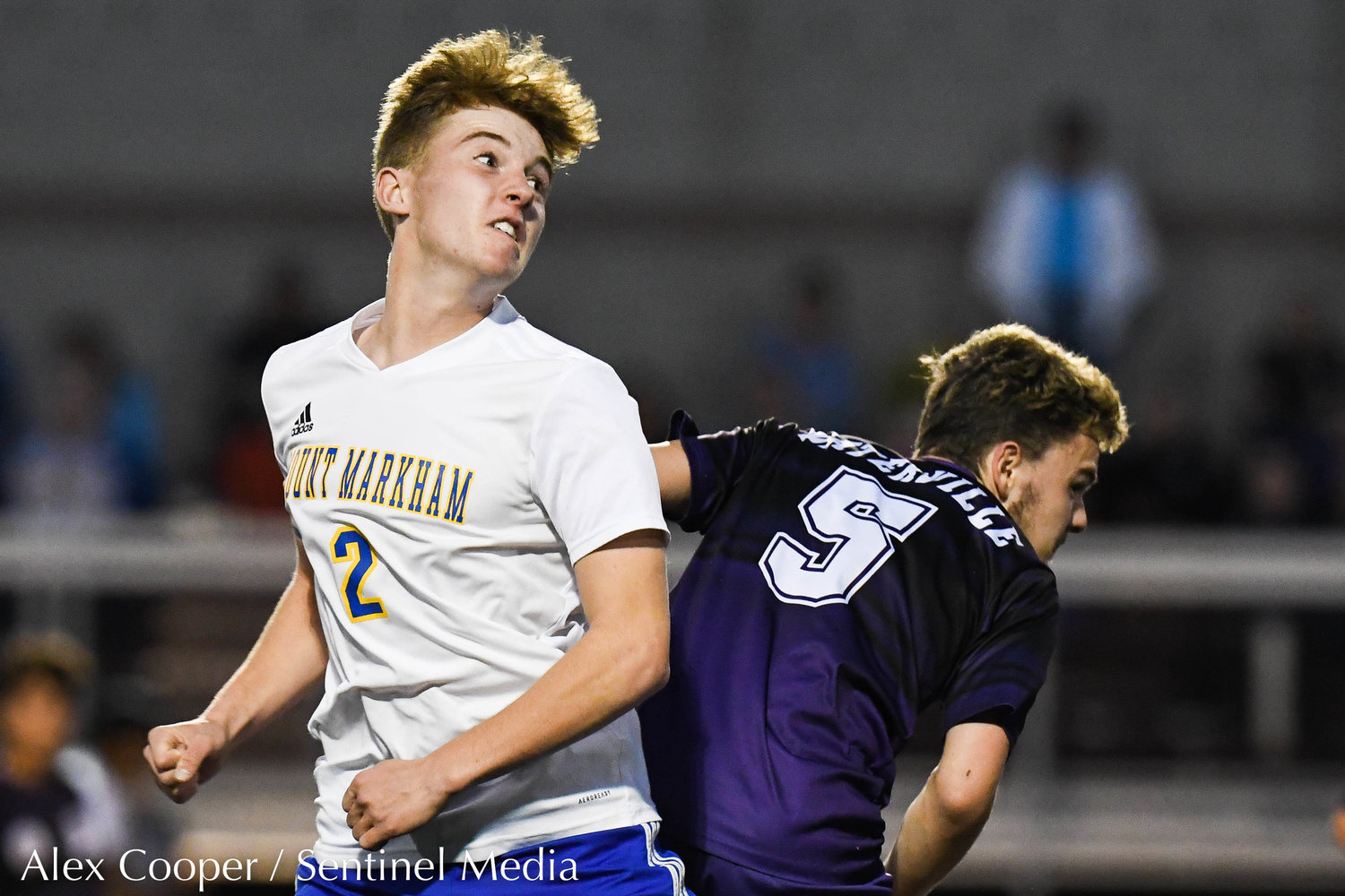 Mt. Markham player Ryan Denton (2) heads the ball forward against Waterville player Braeden (5) during the Class C boys soccer semifinals on Wednesday, Oct. 26 at Canastota. Waterville won 2-1.
