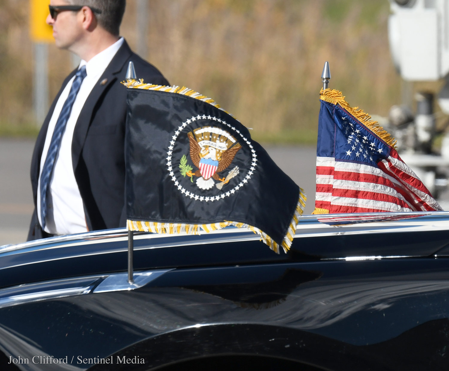 Flags on the front of the presidential limo at Hancock International Airport for President Biden's visit to Syracuse, Thursday, Oct. 27, 2022.