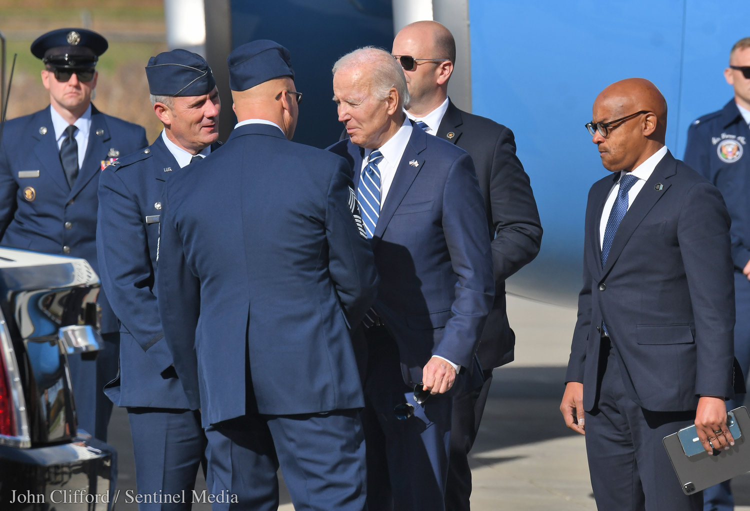 President Joe Biden talks to military personal up his arrival at Hancock International Airport for his visit in Syracuse Thursday, Oct. 27, 2022.