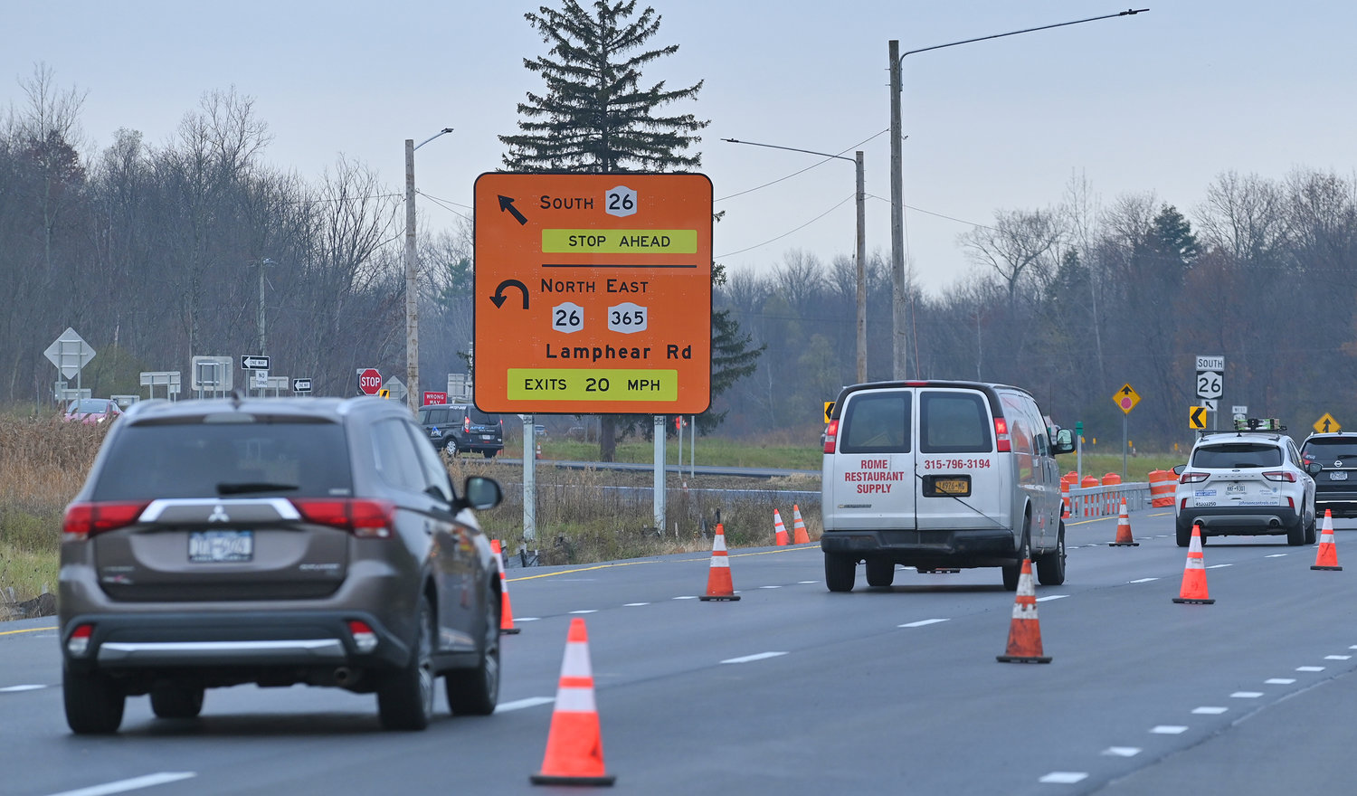 Heading westbound on Route 365 into south Rome, with new signs telling drivers where and how to turn in the new traffic configuration.