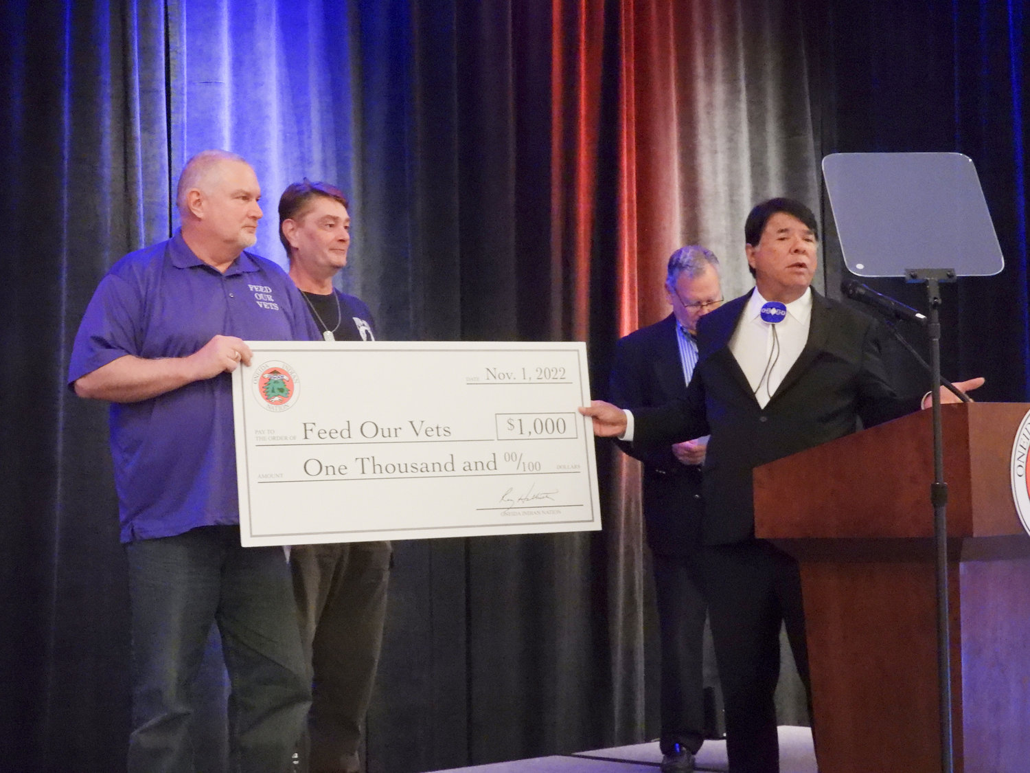 OIN Representative Ray Halbritter presents the Feed Our Vets program with a $1,000 check at the 21st annual Veterans Recognition Ceremony and Breakfast hosted by the Oneida Indian Nation on Tuesday, Nov. 1