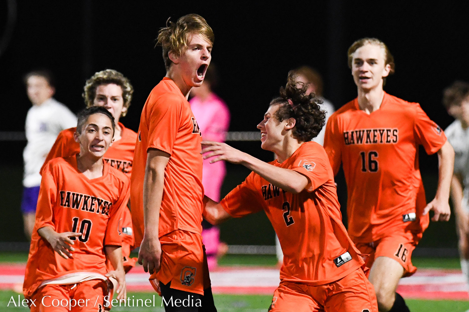 Cooperstown player Oliver Wasson (9) celebrates with teammates after scoring the winning goal in overtime during the Section III Class C final against Waterville on Tuesday, Nov. 1 at VVS High School.