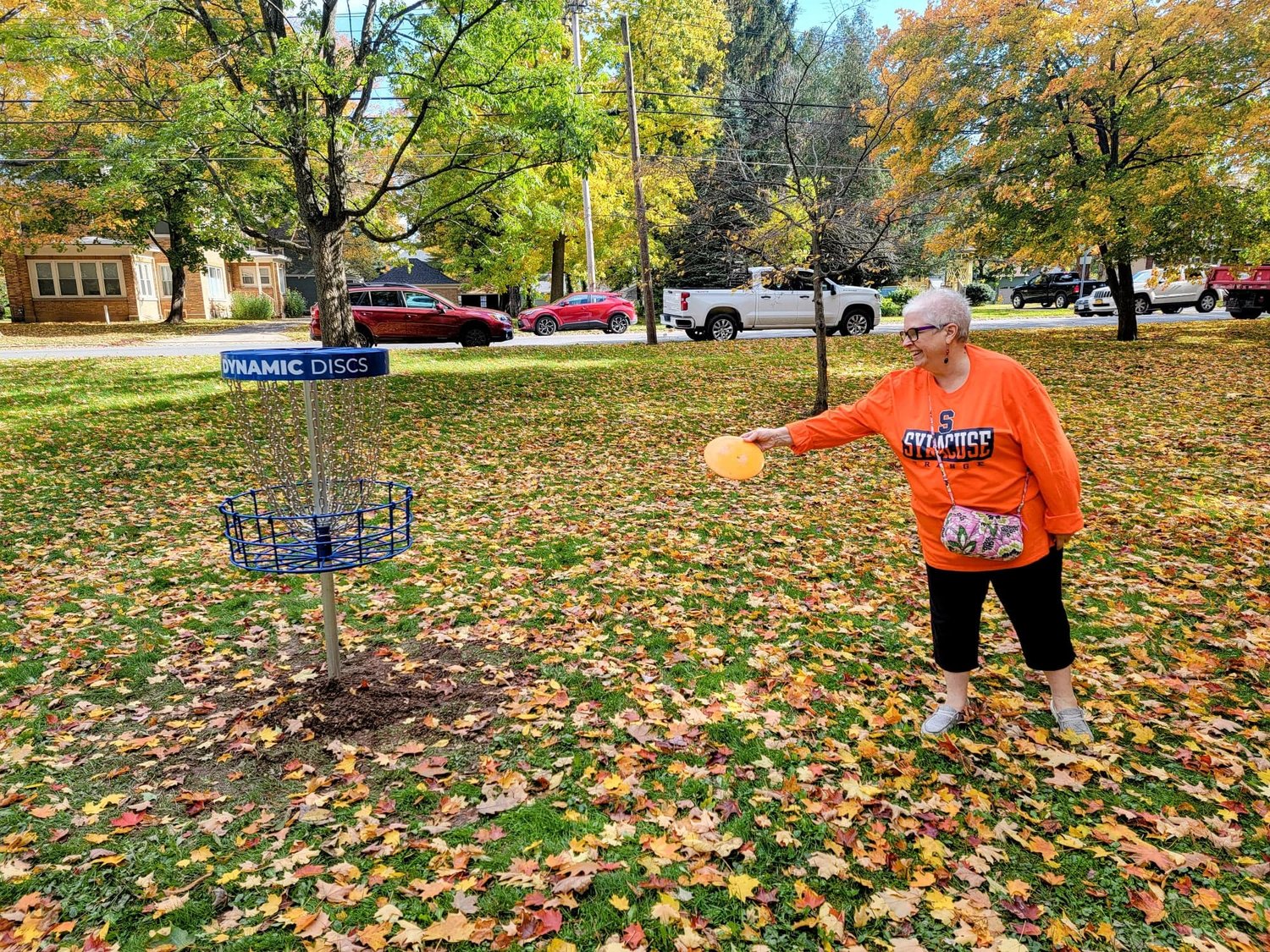 Oneida Mayor Helen Acker tries her hand at disc golf on the new course at Allen Park. The course is open year-round.