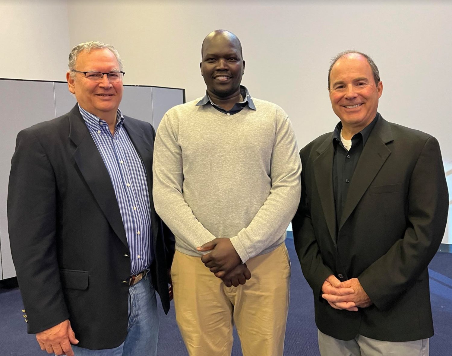Associate Pastor Randy Phillips, left, of the New Beginnings Community Church, opened the YMCA of the Greater Tri-Valley’s annual Prayer Breakfast with prayer. He is pictured with keynote speaker Garang Ajak, of InterFaith Works in Syracuse; and Hank Leo, CEO of the YMCA of the Greater Tri-Valley.