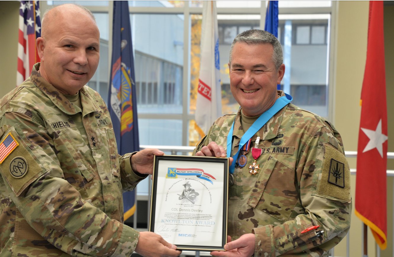 Maj. Gen. Ray Shields, left, the adjutant general of New York, presents the Knowlton Award for military intelligence excellence to New York Army National Guard Col. Dennis Deeley during his retirement from the Army and Army National Guard on Friday, Oct. 29.(Photo courtesy New York Army National Guard)