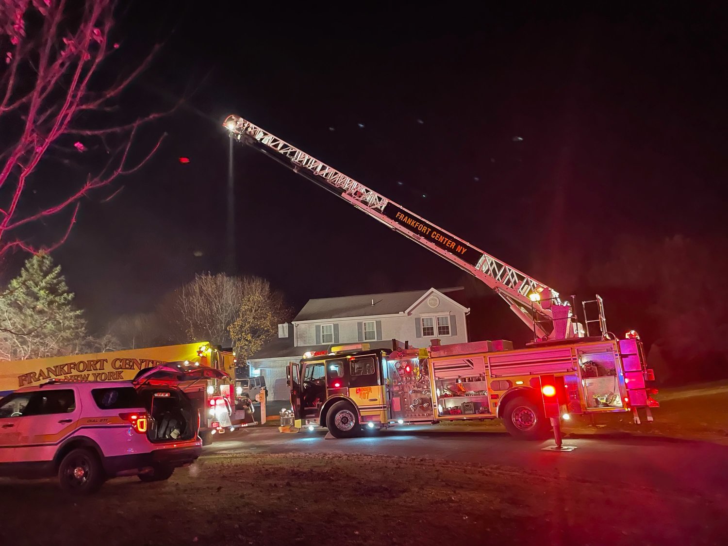 Fire crews battle a roof fire on Wild Flower Circle in Frankfort Thursday night. Fire officials said the residents escaped without injury. The cause of the fire remains under investigation.