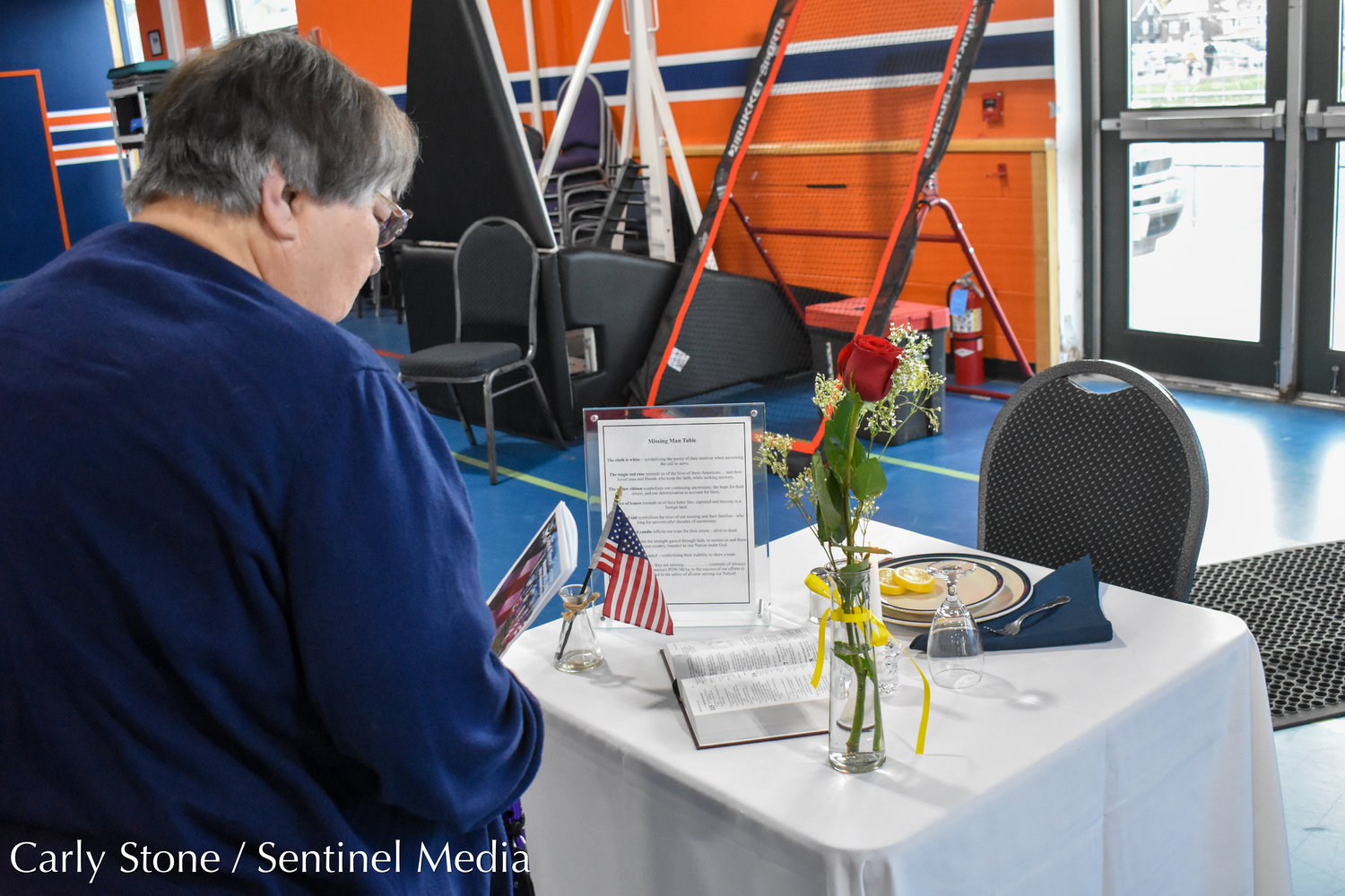 Inside the Parkway Center on Saturday, November 5 was a "
"missing man table," also known as a fallen comrade table. This symbolic gesture is in honor of fallen, missing, or imprisoned military service members. Each item on the table holds a special meaning.