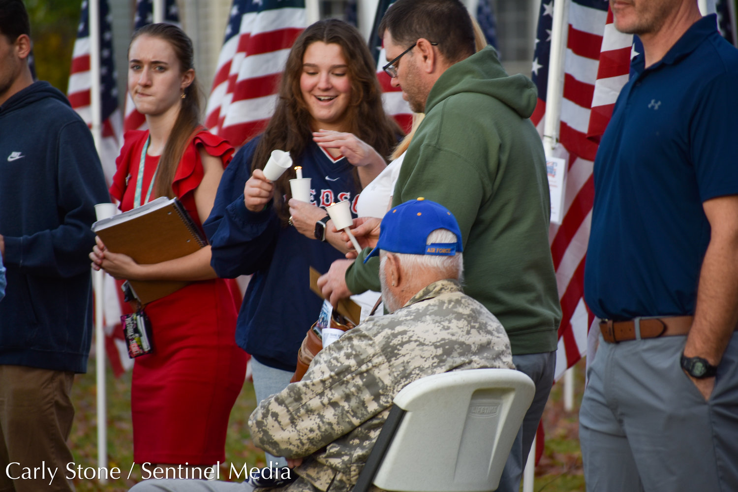 After the recognition ceremony in the Parkway Center on Saturday, November 5, people gathered among the Healing Field of flags at Utica's Memorial Parkway to participate in a candlelight ceremony in honor of the nation's veterans.