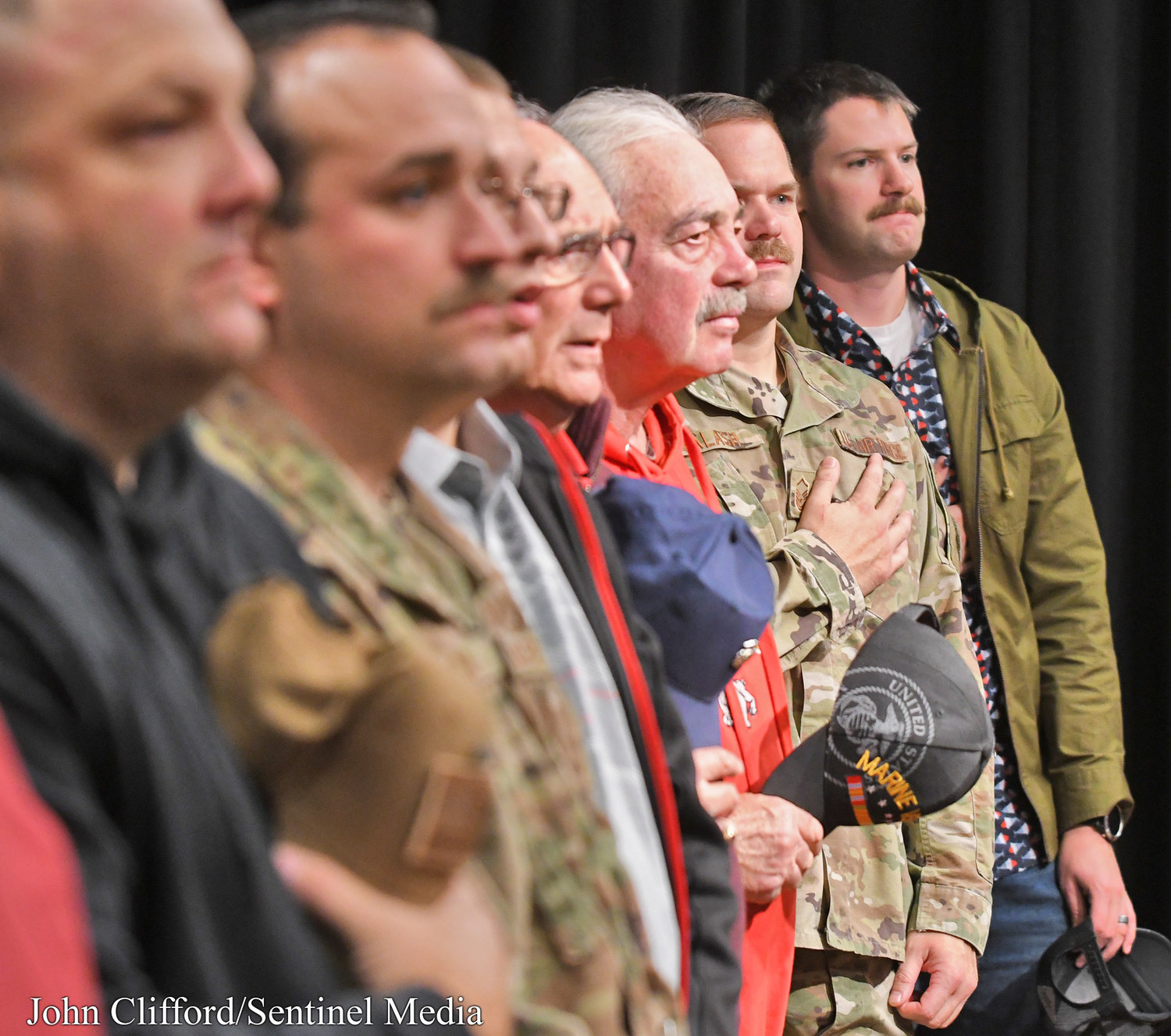 Veterans stand at attention during the Stokes Elementary School Veterans Day ceremony Thursday, November 10, 2022.