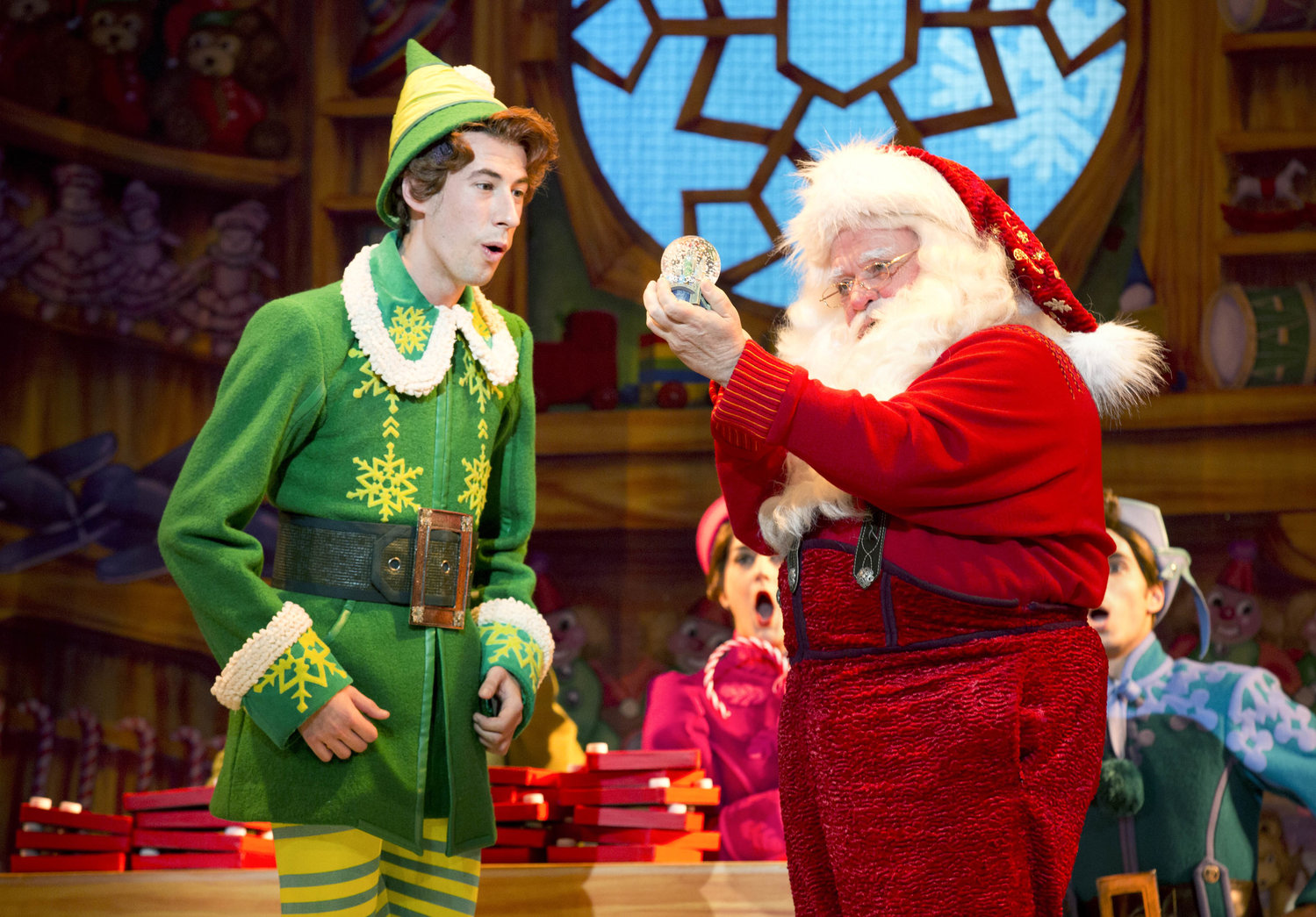 Buddy the Elf confers with Santa in this scene from ‘Elf the Musical,’ presented at 7 p.m. Nov. 16-17 at The Stanley Theatre in Utica by The Broadway Theatre League.
