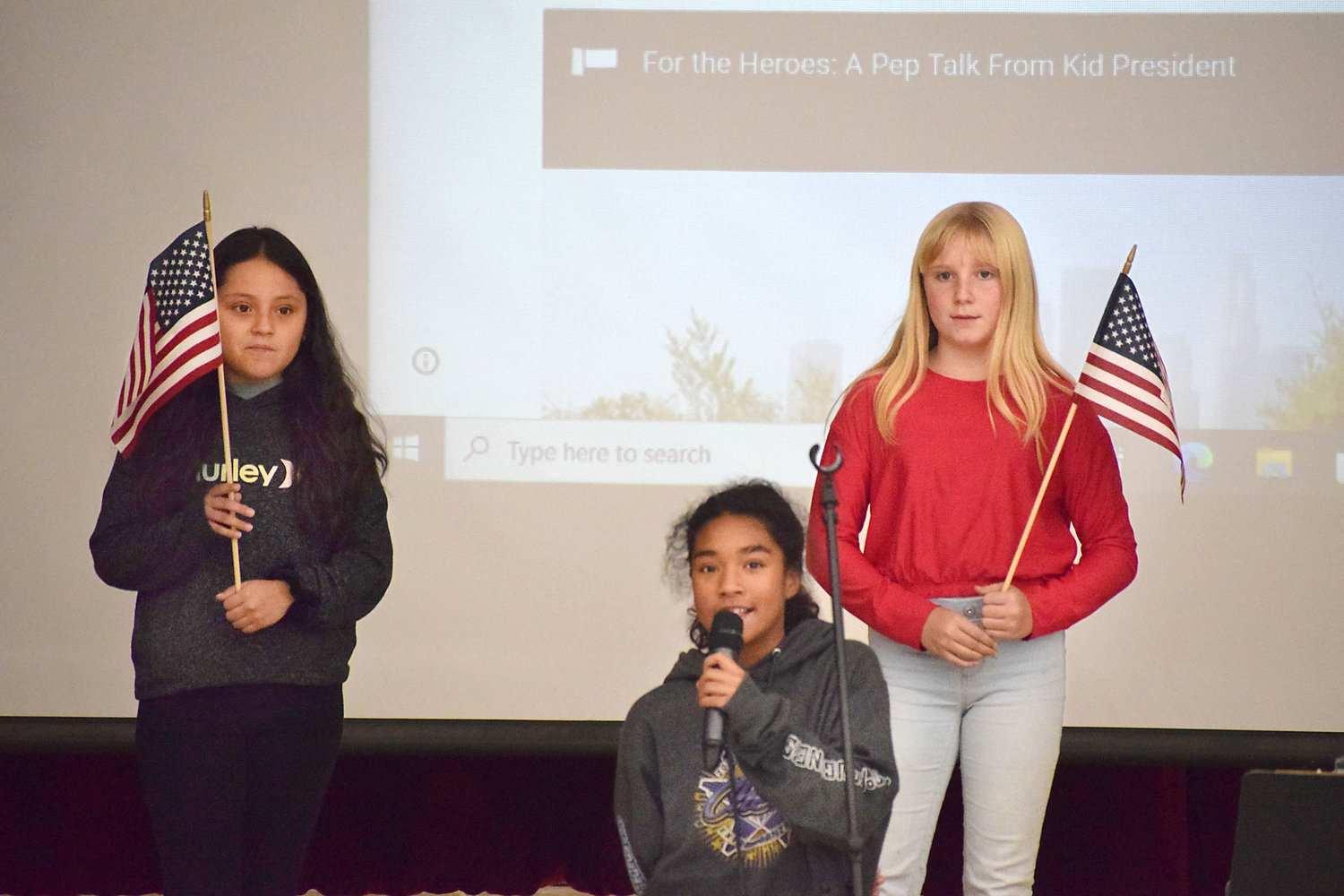 Herkimer Elementary School students Cassey Vintimilla and Zoey Slowik were flag holders and Maliyah Brown led the group in The Pledge of Allegiance Wednesday during a respect-themed assembly.