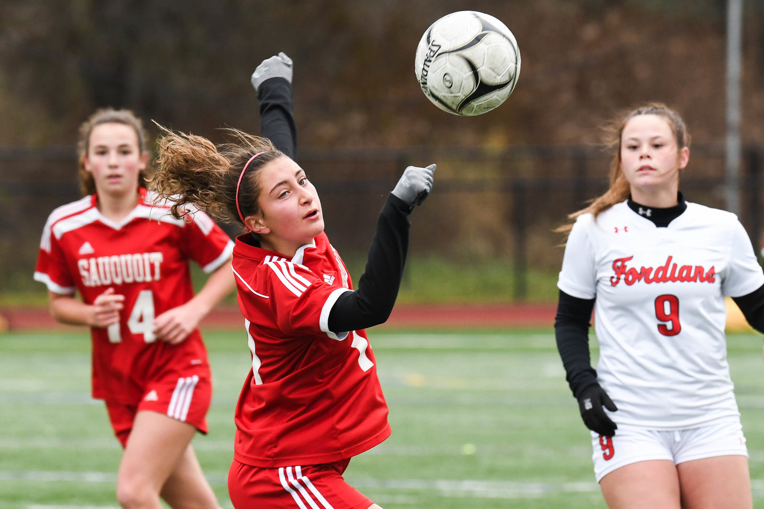 Sauquoit Valley forward Olivia Kalil, center, heads the ball during the Class C state final against Waterford-Halfmoon on Sunday at Cortland High School. Sauquoit lost 6-3.