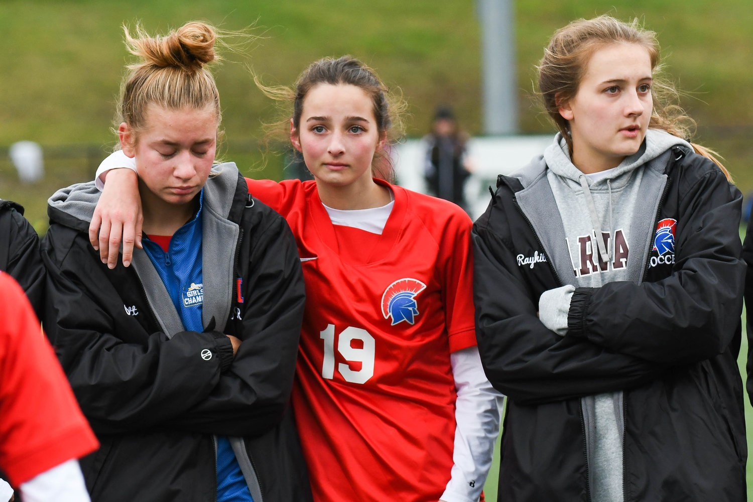 New Hartford soccer players react after losing to Albertus Magnus 3-1 in the Class A state final on Sunday at Tompkins-Cortland Community College. The loss ended the program's 59-game unbeaten streak.
