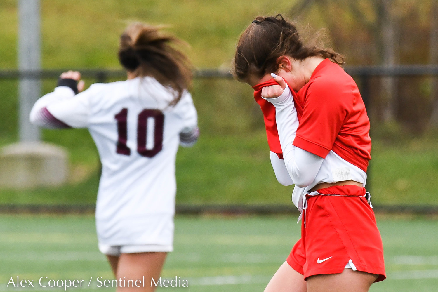 A New Hartford player reacts after losing to Albertus Magnus 3-1 in the Class A state final on Sunday at Tompkins-Cortland Community College.