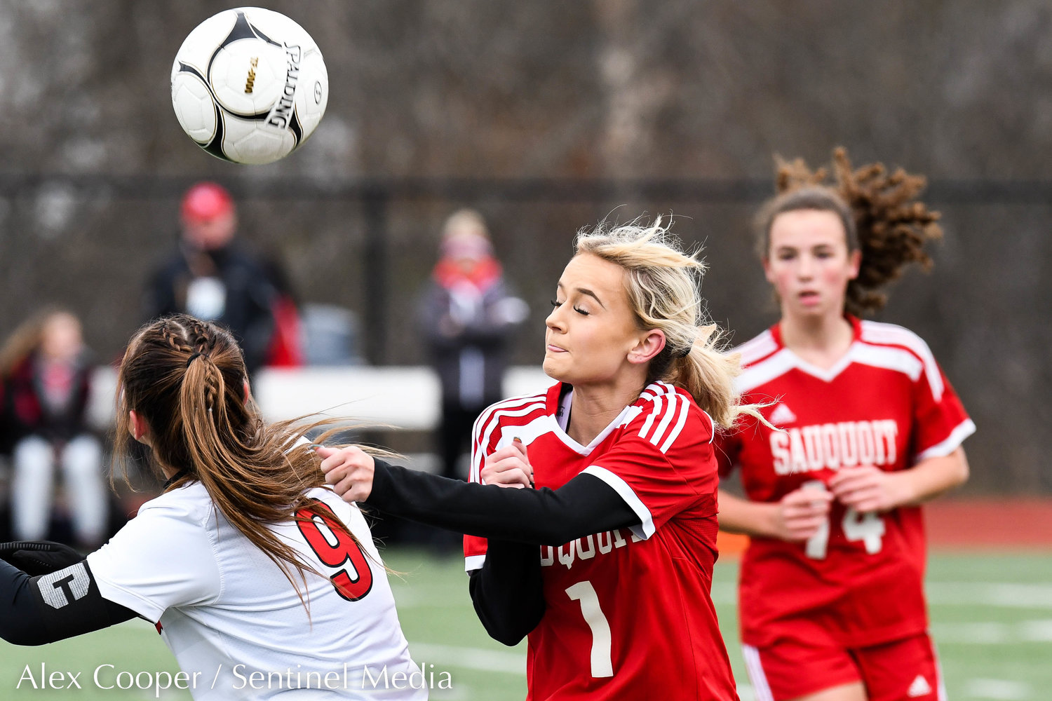 Sauquoit Valley player Paige Kuhn (1) heads the ball against Waterford-Halfmoon player Sophia Belonga (9) during the Class C state final on Sunday at Cortland High School. The Indians lost 6-3.