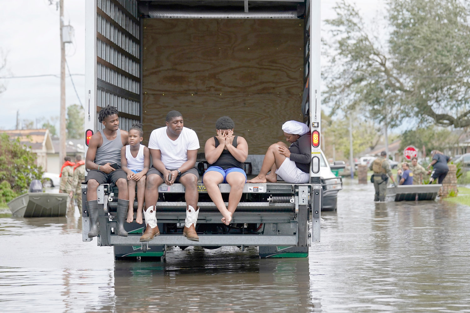 People are evacuated from floodwaters in the aftermath of Hurricane Ida in LaPlace, La., in this August 2021 file photo. 90% of counties in the United States experienced a weather-related disaster between 2011-2021, according to a report published on Wednesday, Nov. 16.