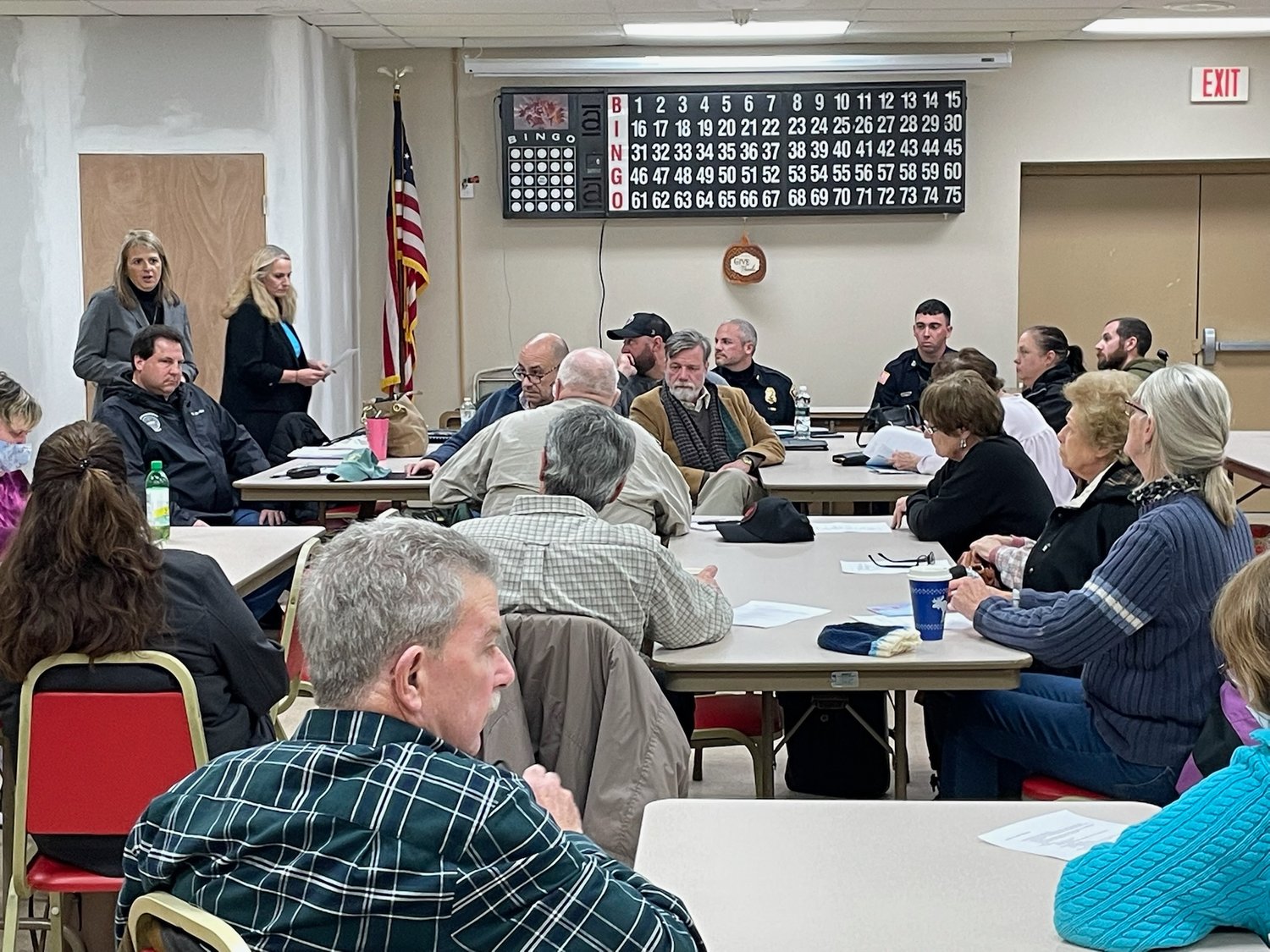 Rome Common Council President Stephanie Viscelli and Third Ward Councilor Kimberly Rogers, both at back left, address a group of residents and members of the city’s police and codes departments to open Rome’s first Public Safety Meeting on Wednesday night at the South Rome Senior Center.