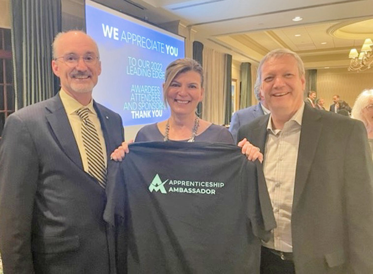 MVCC President Randall VanWagoner, left, Wolfspeed Chief Human Resources Officer Margaret Chadwick, center, and MACNY President and CEO Randy Wolken celebrate a new partnership that will create a New York State Registered Apprenticeship Program.