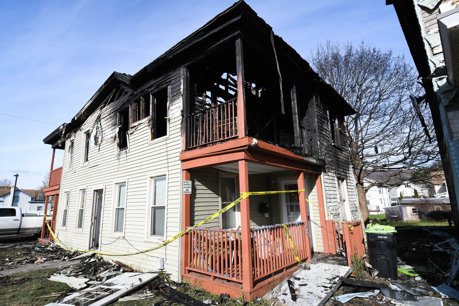 One of two homes heavily damaged by fire on East Clark Street in Ilion Monday evening. A total of 13 people — nine adults and four children — have been displaced from their homes. Fire officials said no one was injured.