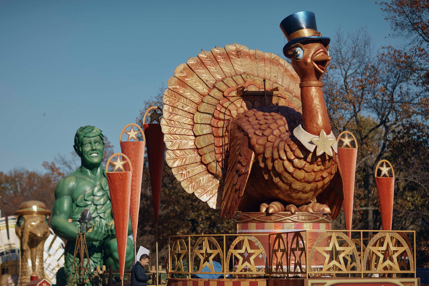A man inspects a float of Tom Turkey that is lined up for the Macy's Thanksgiving Day Parade on Wednesday, Nov. 23, 2022. Macy's Thanksgiving Day Parade will take place on Thursday.
