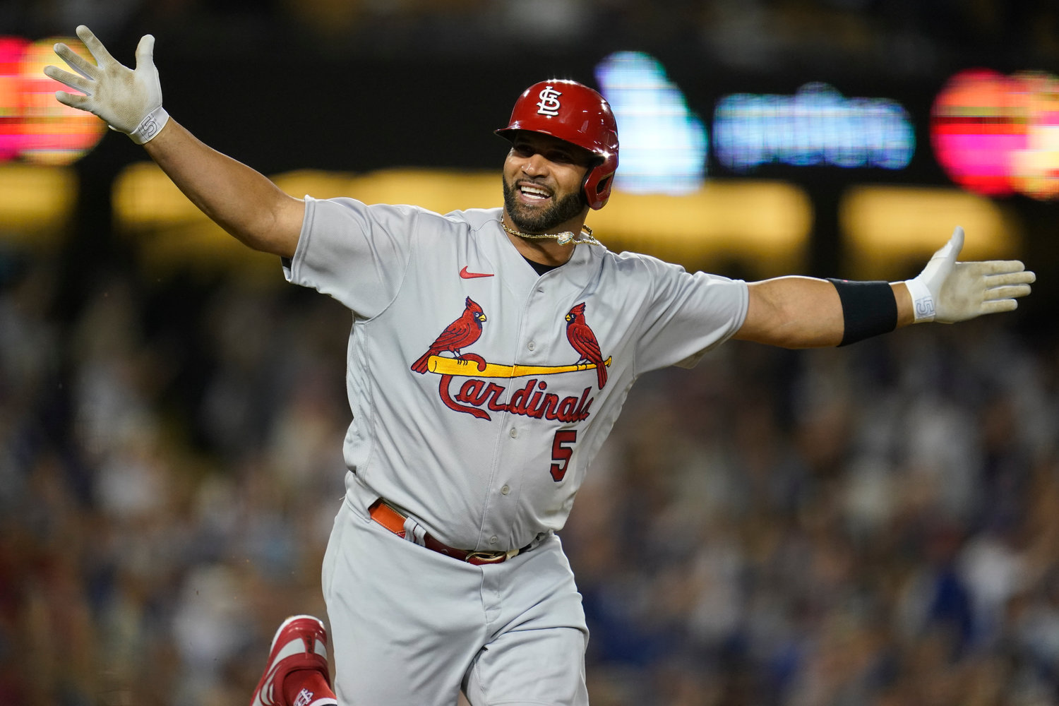 St. Louis Cardinals designated hitter Albert Pujols reacts after hitting his 700th home run on Sept. 23. Pujols won the National League Comeback Player of the Year award.