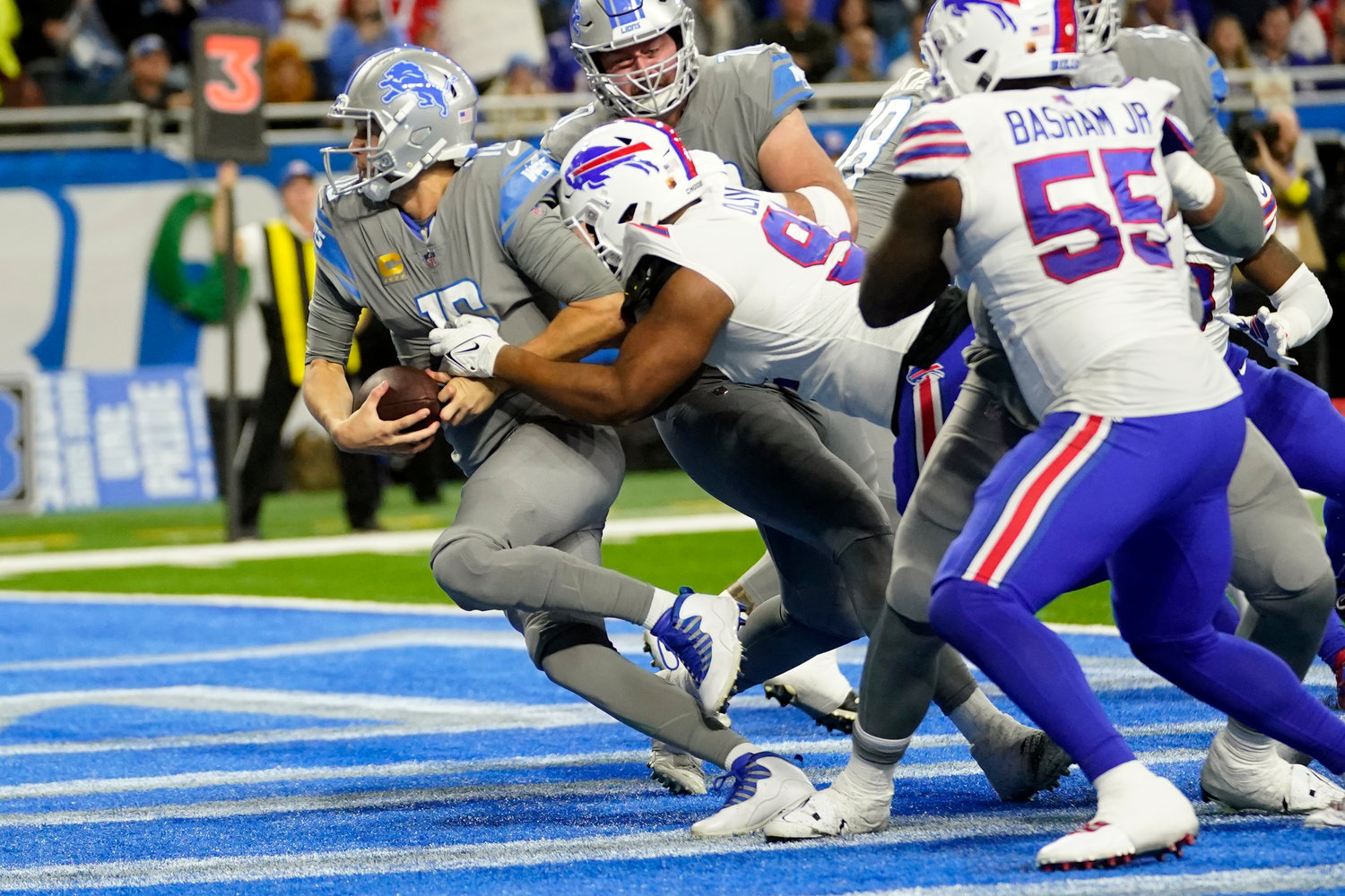 Detroit Lions quarterback Jared Goff (16) is tackled by Buffalo Bills defensive tackle Ed Oliver (91) for a safety during the second half on Thursday afternoon in Detroit. The Bills won 28-25.