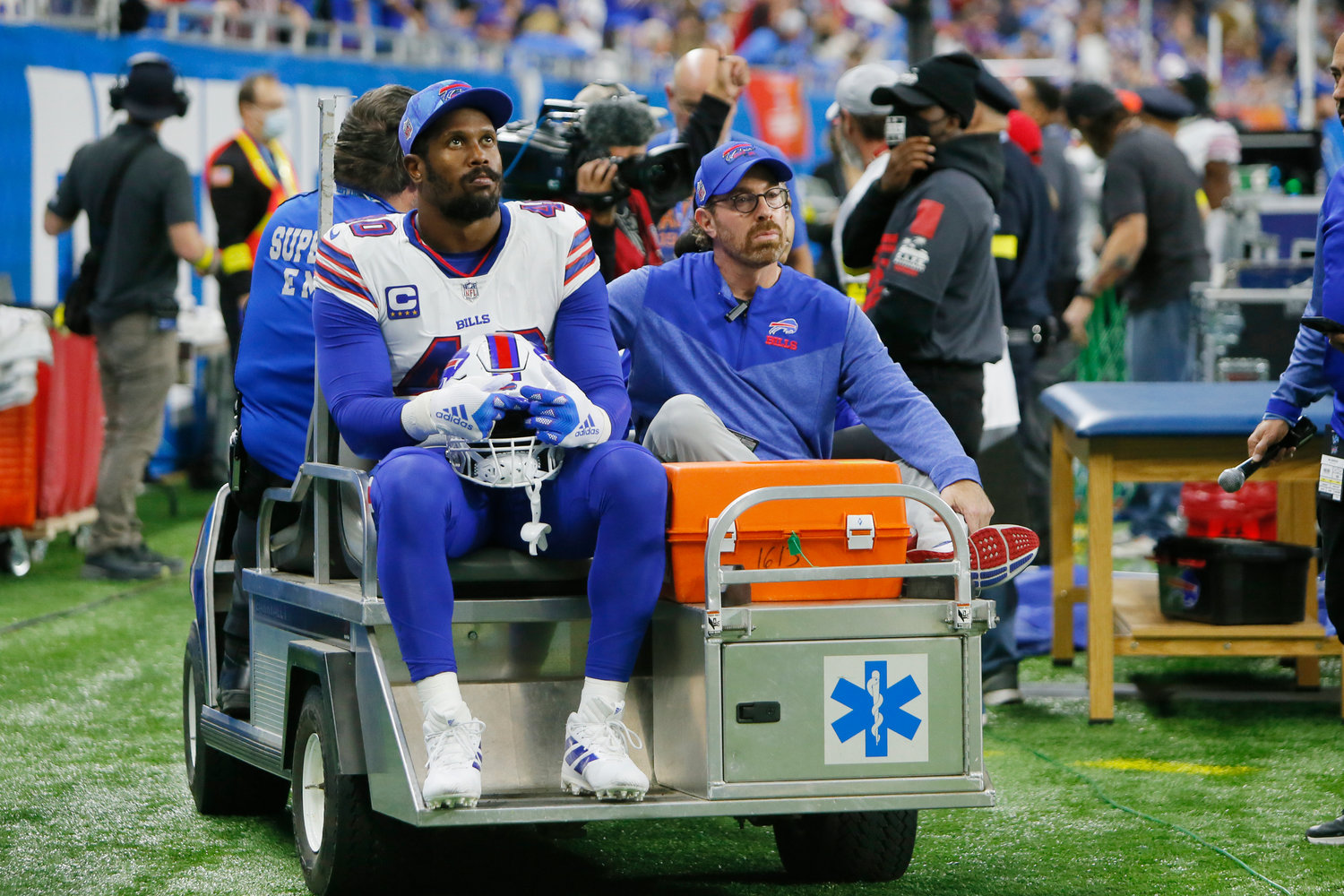 Buffalo Bills linebacker Von Miller is carted off the field during the first half against the Detroit Lions on Thursday afternoon in Detroit.