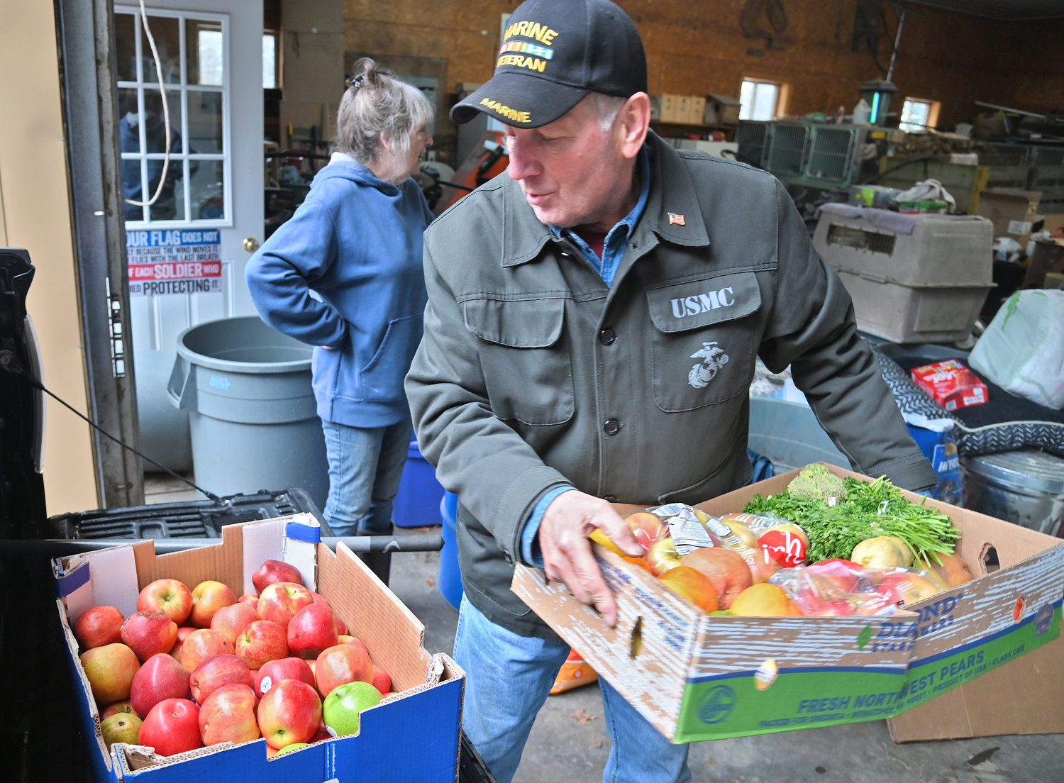 Vinnie Egresits unloads a supply of produce from an area grocery store. Woodhaven Wildlife Center gets the donation four times a week.