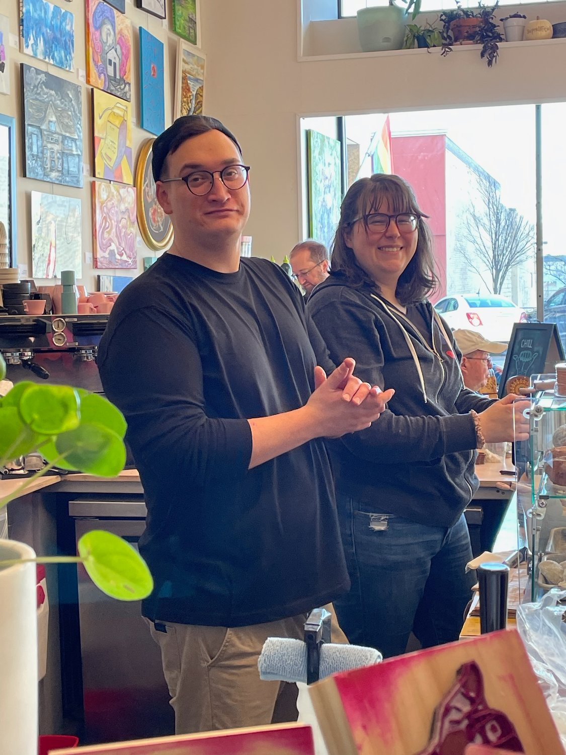 Happy to be busy on Small Business Saturday, husband-and-wife team Jonathon and Caitlin Matwijec-Walda take drink orders at their superofficial shop in downtown Rome.