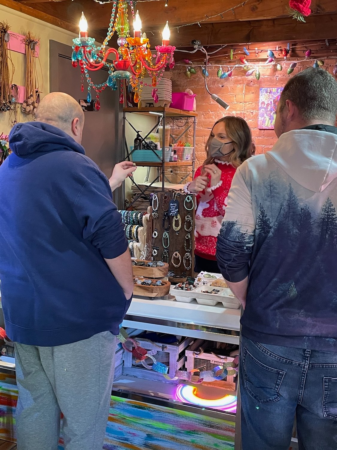 Shoppers browse succulents and other unique gift items at The Rainbow Cupboard located at 4 College St. in Clinton on Small Business Saturday.