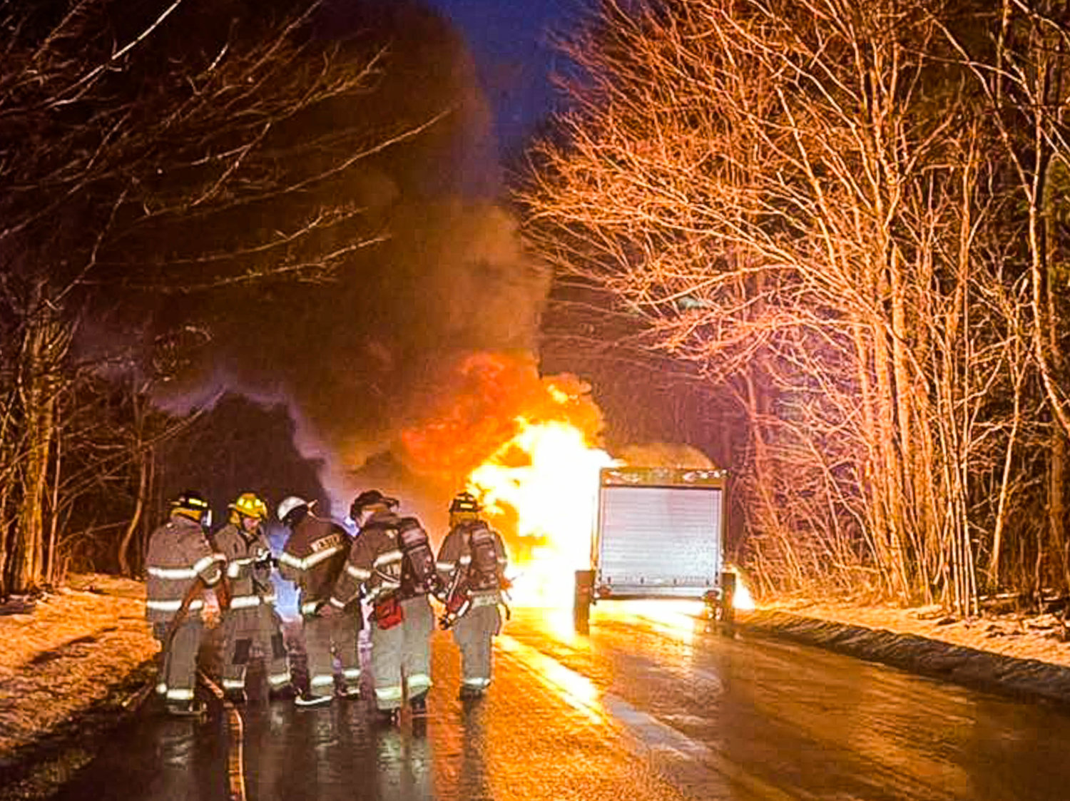 Western firefighters work to douse a fully involved pickup truck fire on North Steuben Road in Steuben Sunday evening. No one was injured.