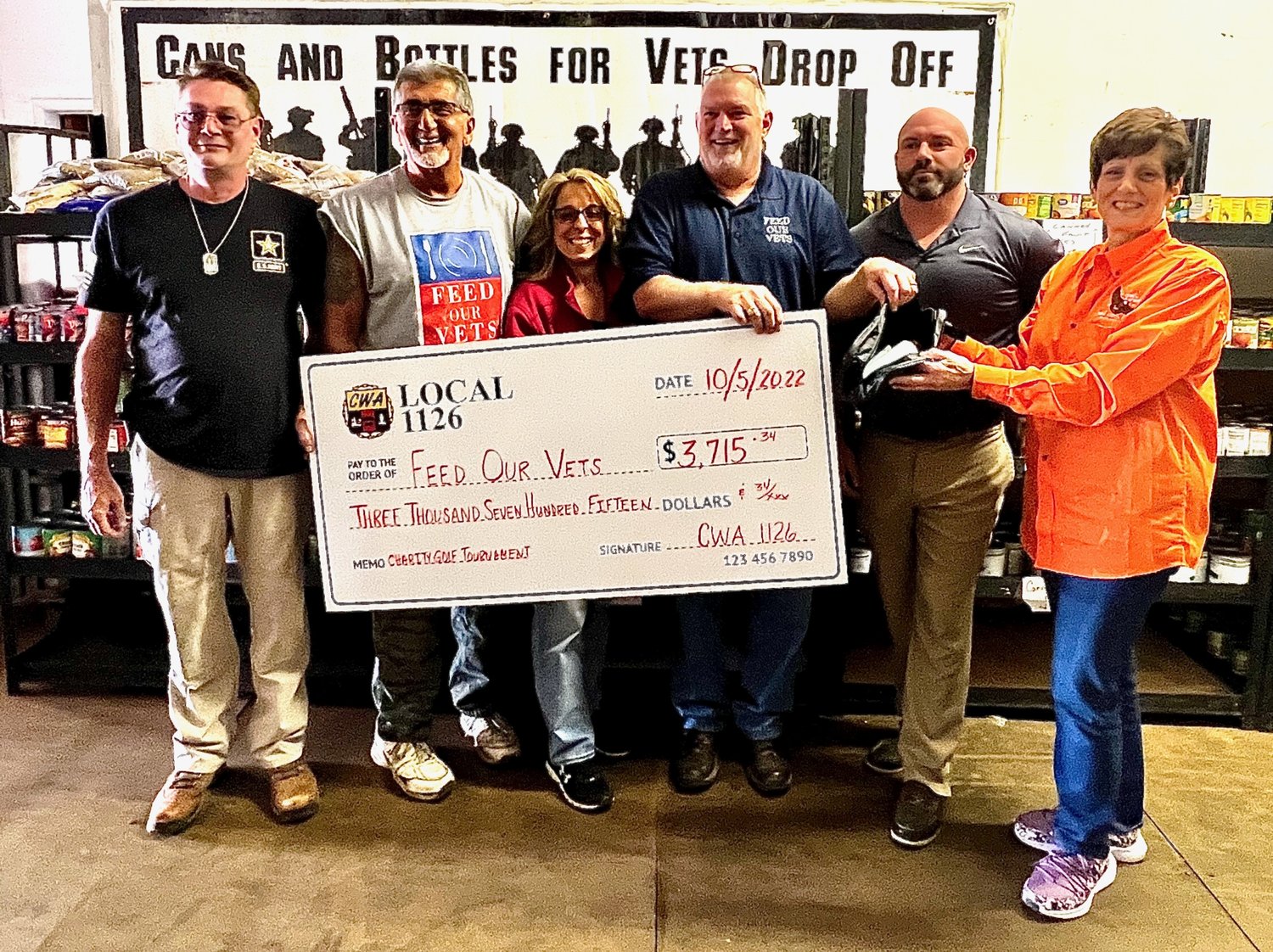 Organizers of the annual 2022 Communications Workers of America Local 1126/Leatherstocking Club Charity Golf Tournament present a check for $3,715 to the Feed Our Vets program. From left: Carl Davis, Joe Ancona, Christina Cirasuolo-Trzepacz, Rich Synek, Jeff Kinne, and Jacqueline Schmidt.