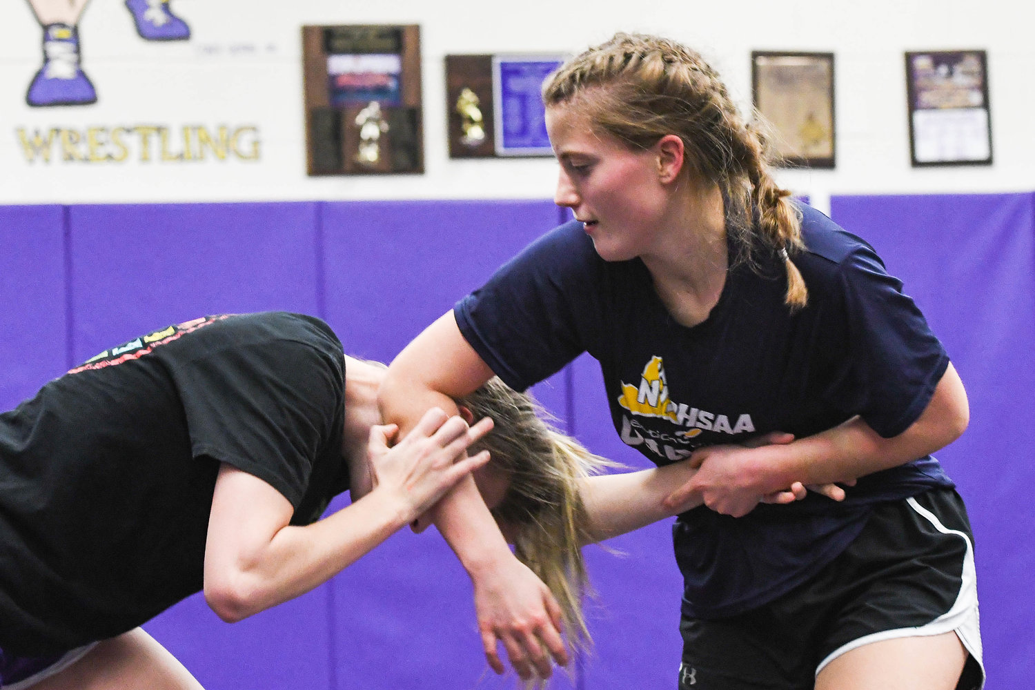 Holland Patent wrestler Addison Snider, right, practices with a teammate on Monday at Holland Patent High School.