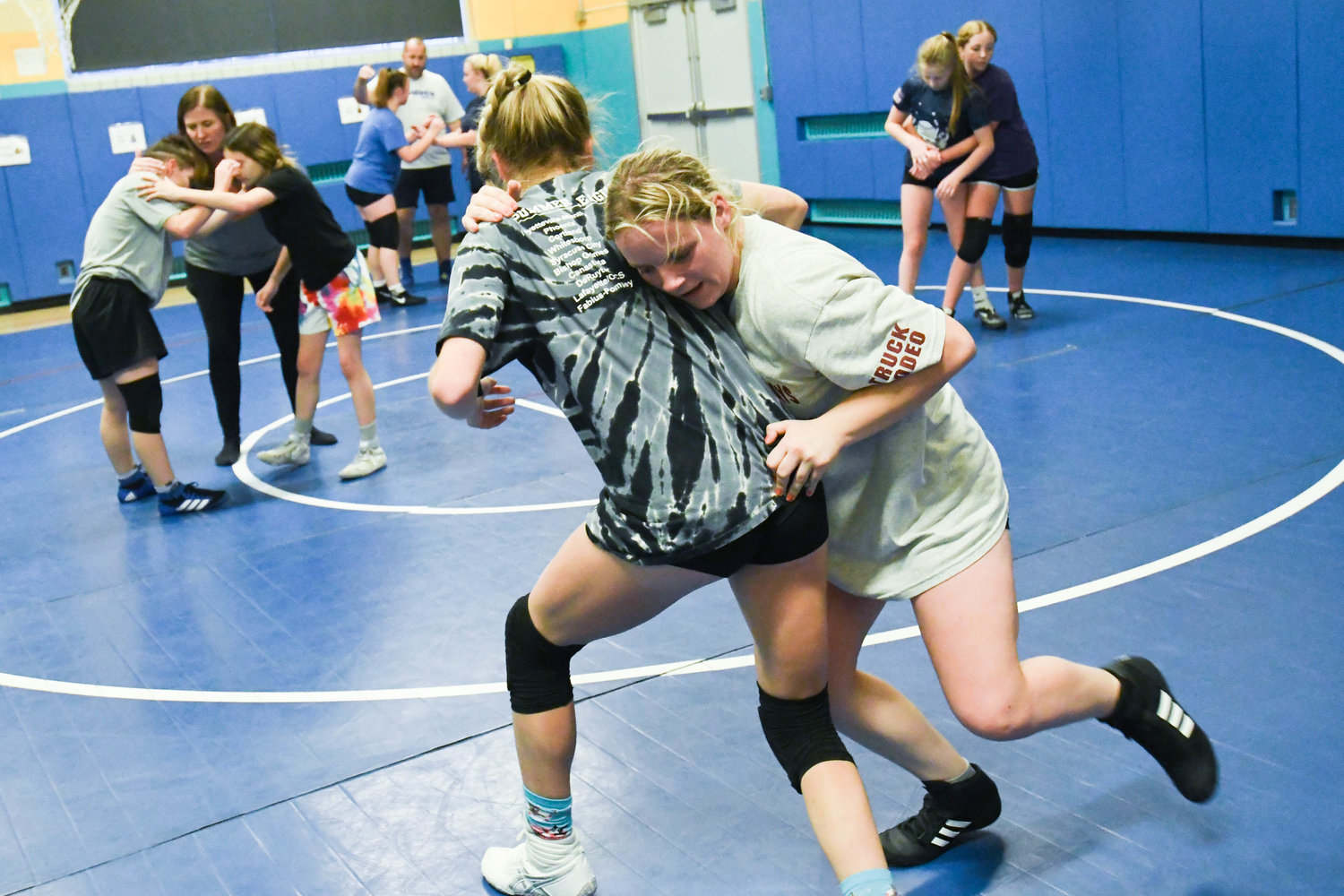 Camden wrestlers McKenzie Aldridge and Megan Trautner, front, practice with others on Monday at Camden Elementary School.