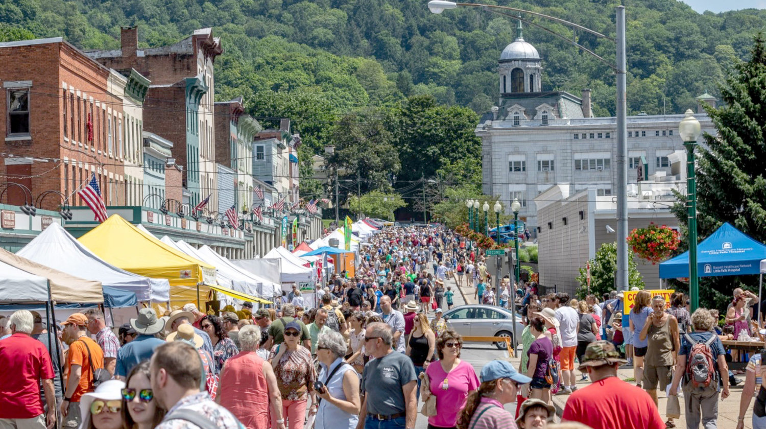 Litte Falls Downtown Revitalization Initiative — Crowds line Main Street during a previous Cheese Festival in Litte Falls in this file photo. The city’s Main Street and downtown area will get a $10 million enhancement as part of the state’s Downtown Revitalization Initiative. See story on page 4.