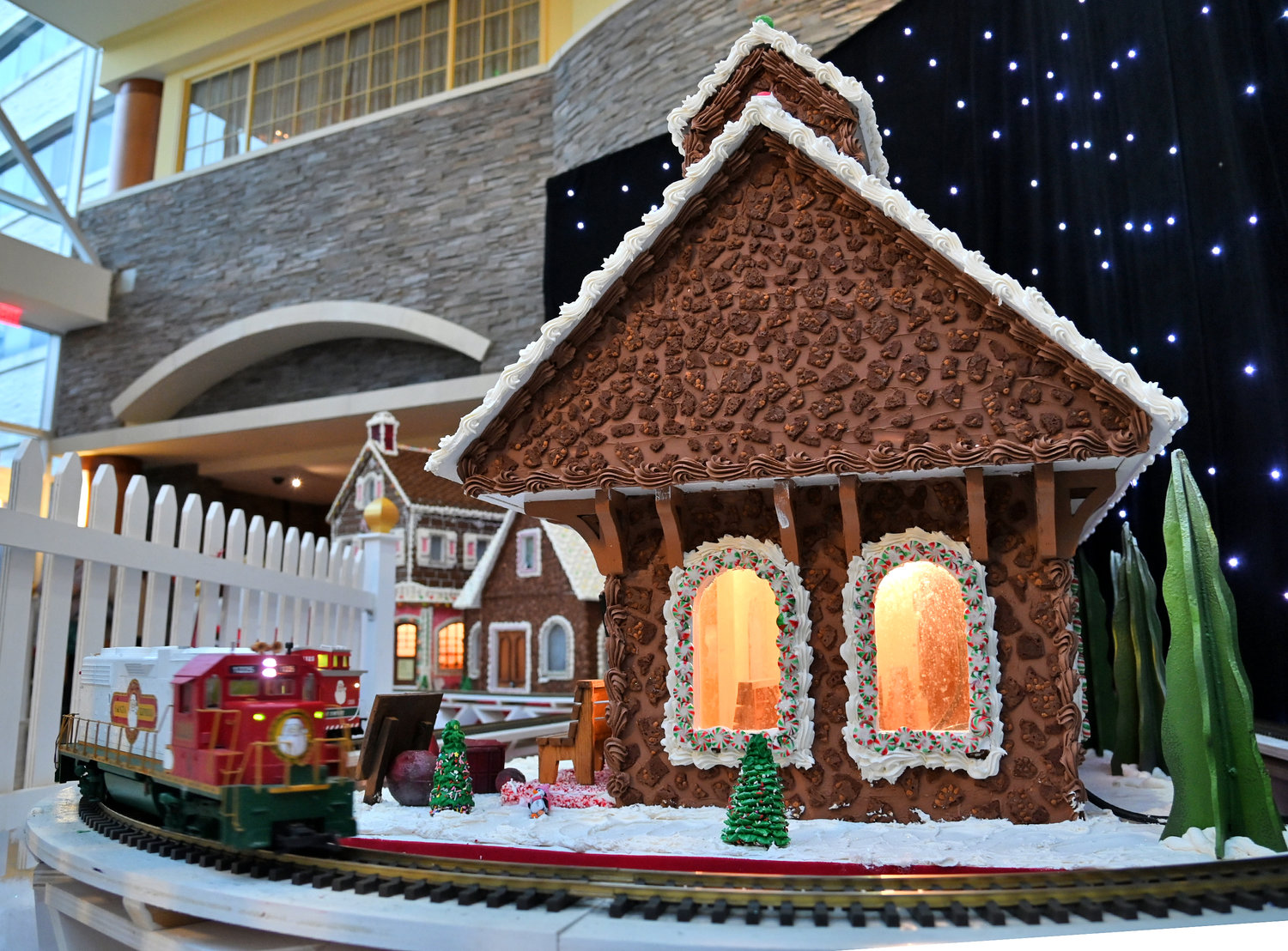 The gingerbread train station with the Santa Express cruising through at Turning Stone Casino Wednesday, Nov. 30.