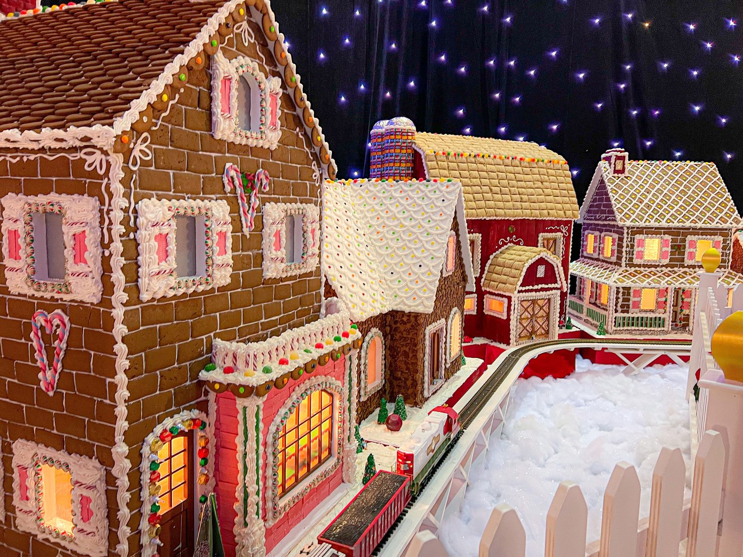Turning Stone’s award-winning pastry team designed this year’s Gingerbread Village with a nod to traditional nostalgic gingerbread houses by incorporating popular candies including NECCO wafers, pinwheel mints, and Spree tart candy.